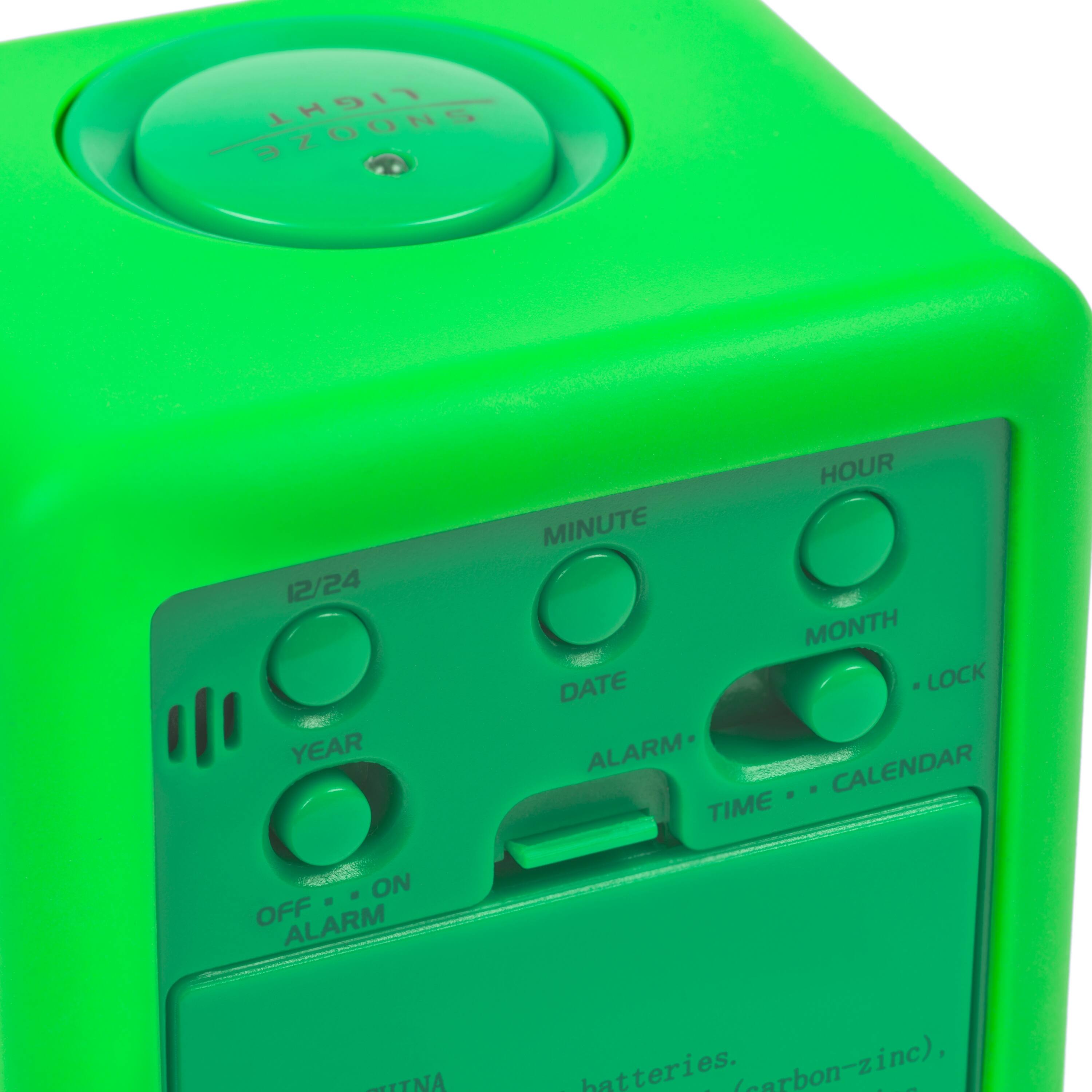 LIGHT SNOOZE 12/24 YEAR HOUR MINUTE MONTH DATE LOCK ALARM CALENDAR TIME ON - OFF ALARM ALTERNATE batteries. (carbon-zinc)