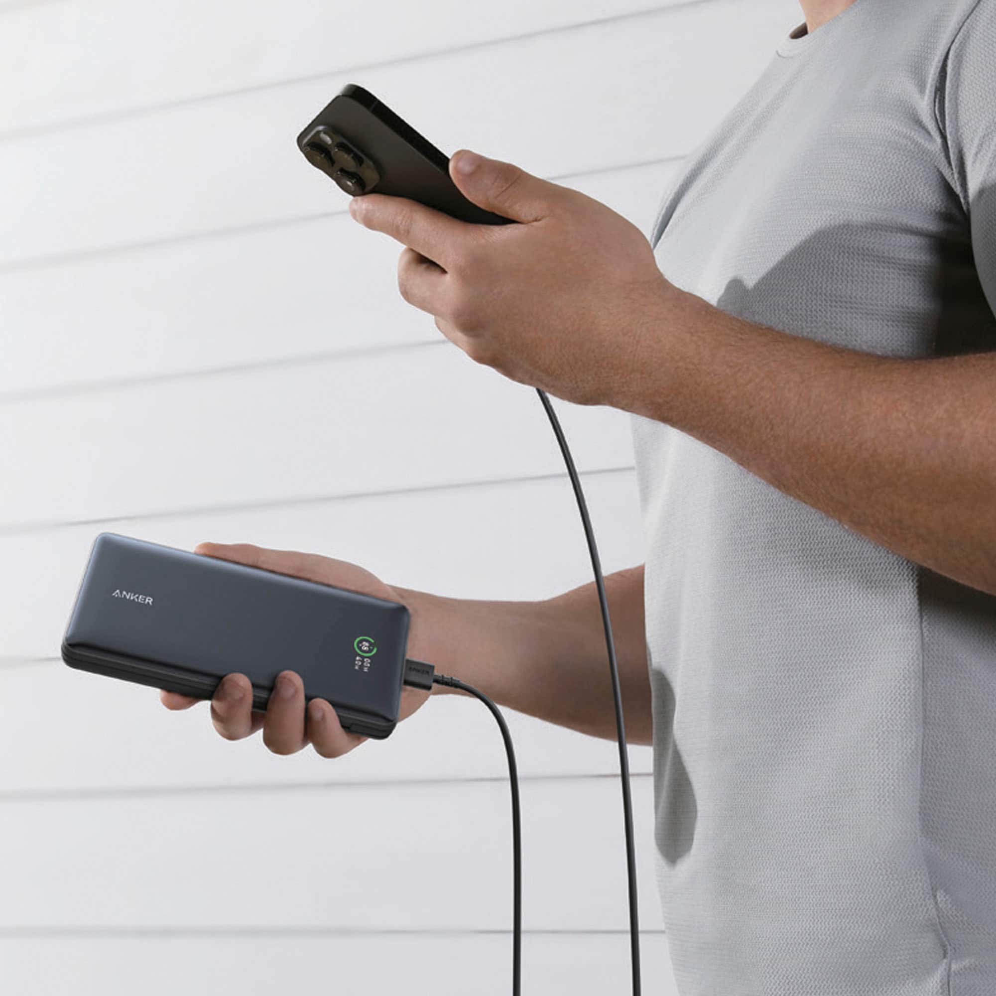 Left. Anker - Anker - Power Bank (20,000mAh, 30W PD w/ built in USB-C Cable) - Black.