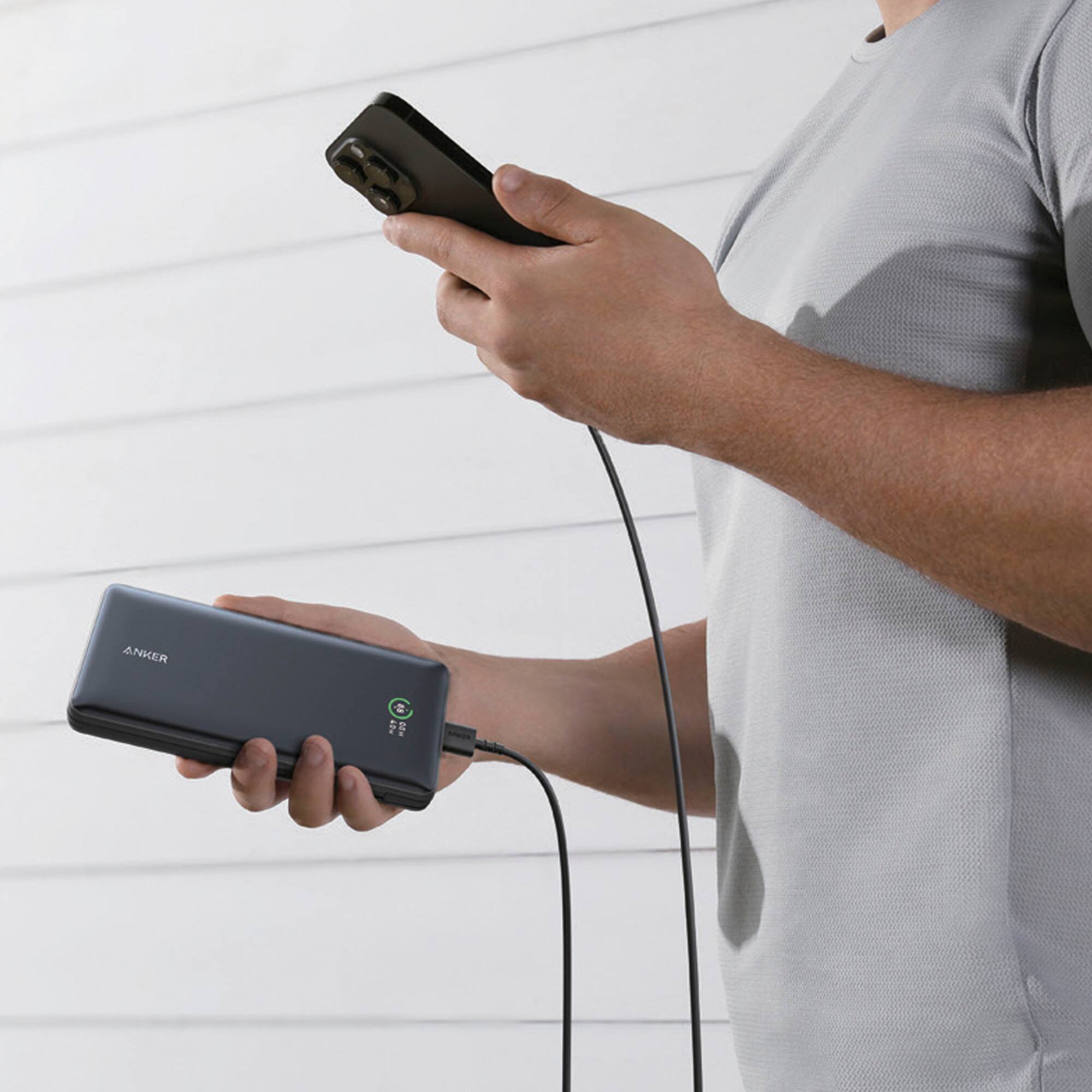 Left. Anker - Anker - Power Bank (20,000mAh, 30W PD w/ built in USB-C Cable) - Black.