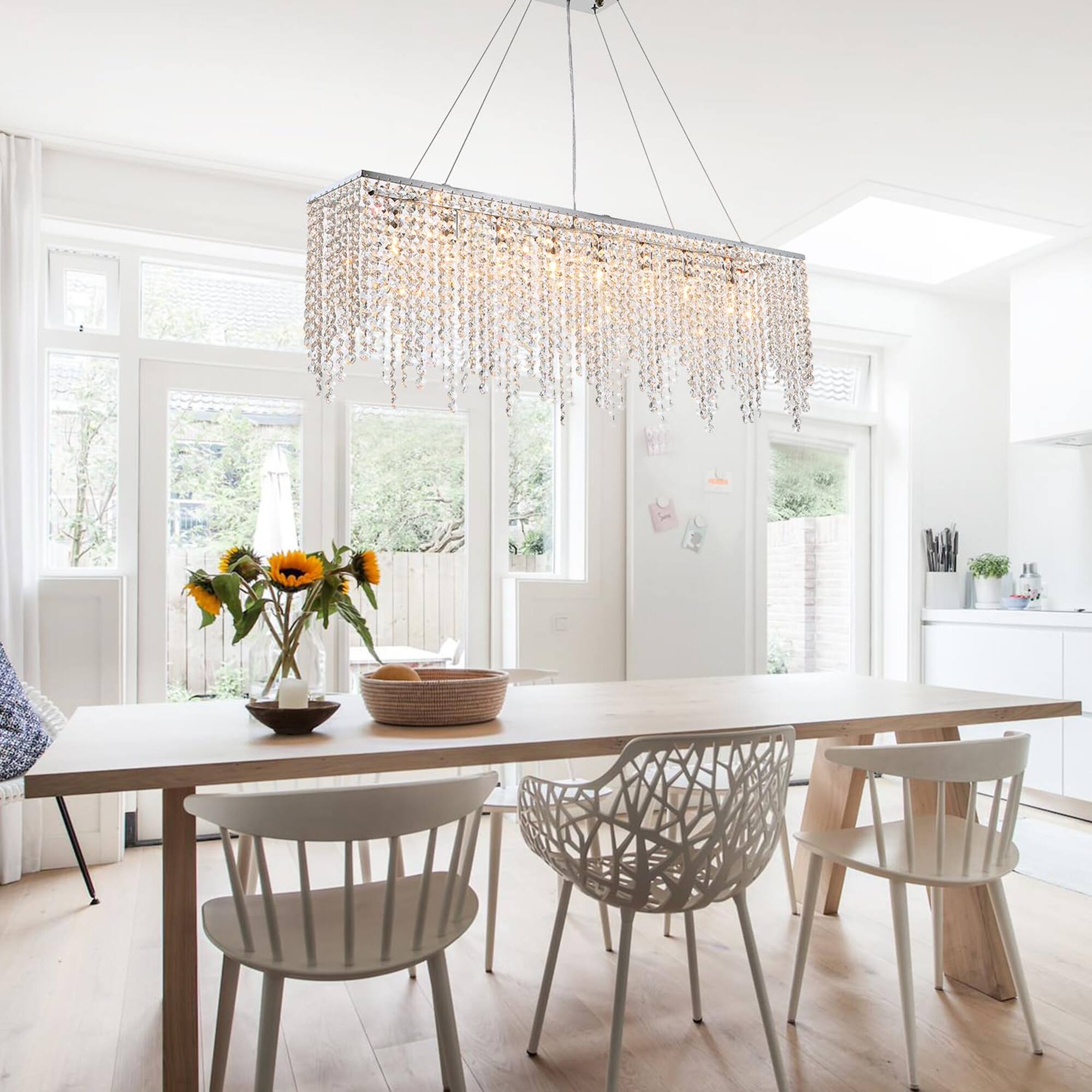 Left. Siljoy - 10 Light Rectangle Crystal Chandelier Ideal for Dining Room & Kitchen Island Pendant Lighting - Silver.