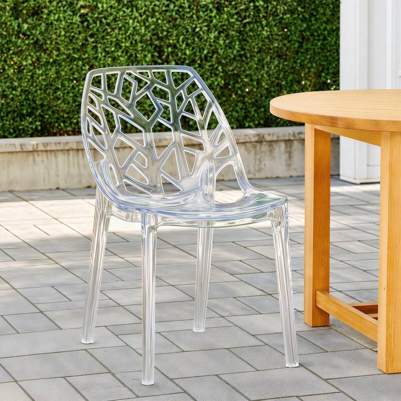 Angle. LeisureMod - Cornelia Modern Stackable Accent Dining Chair with Cut Out Backrest Design for Dining Rooms or Patios - Clear.