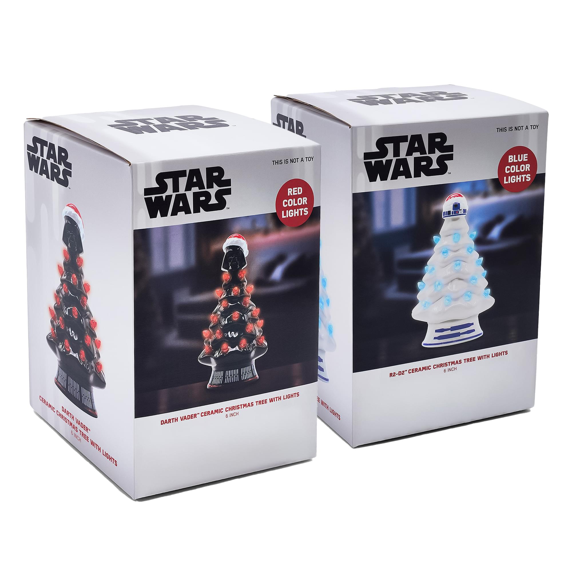 STAR WARS  
THIS IS NOT A TOY  
RED COLOR LIGHTS  
DARTH VADER CERAMIC CHRISTMAS TREE WITH LIGHTS  
6 INCH  

STAR WARS  
THIS IS NOT A TOY  
BLUE COLOR LIGHTS  
R2-D2 CERAMIC CHRISTMAS TREE WITH LIGHTS  
6 INCH