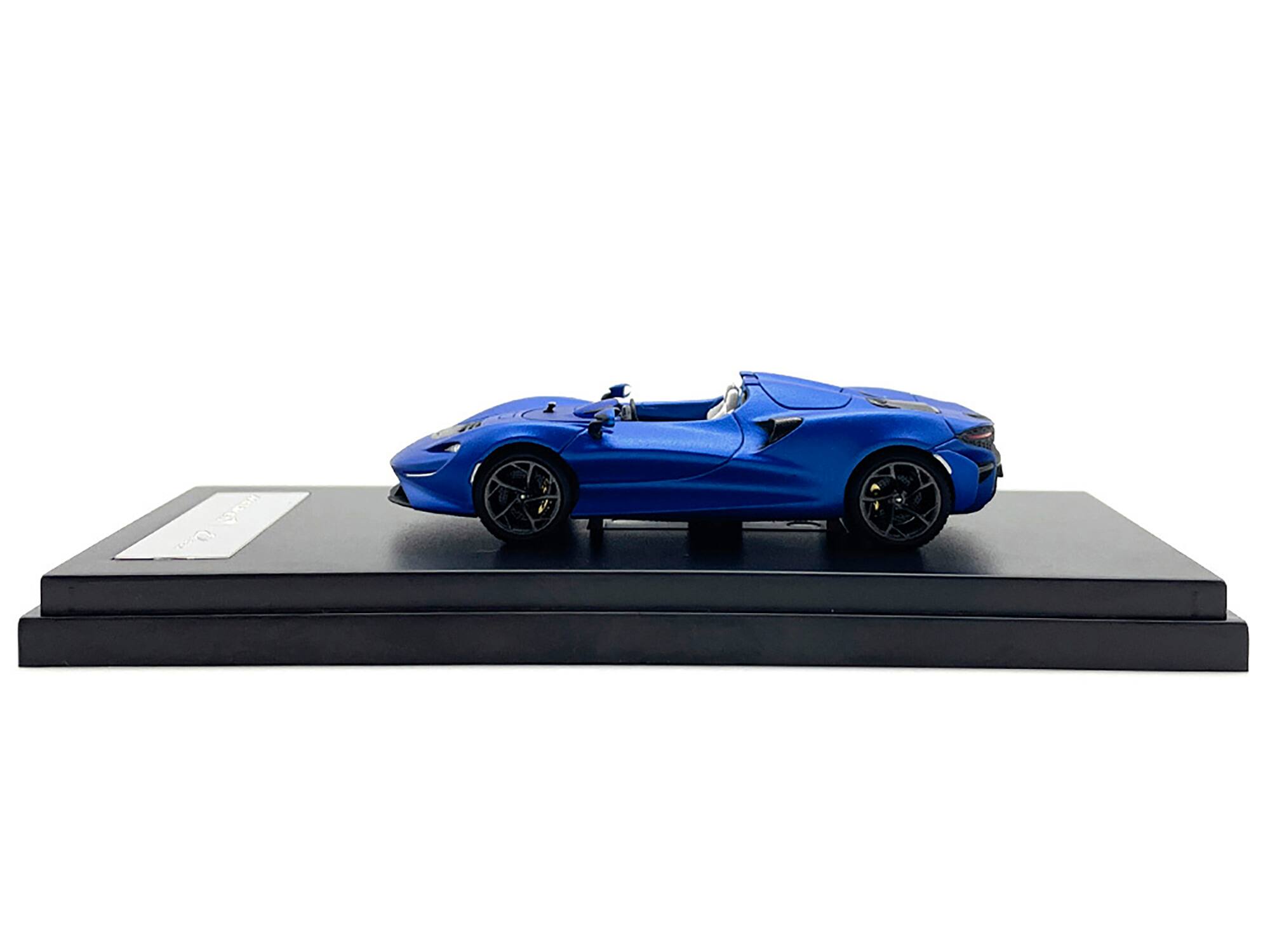 Left. LCD Models - McLaren Elva Convertible Matt Blue Metallic 1/64 Diecast Model Car by LCD Models - Matt Blue Metallic.