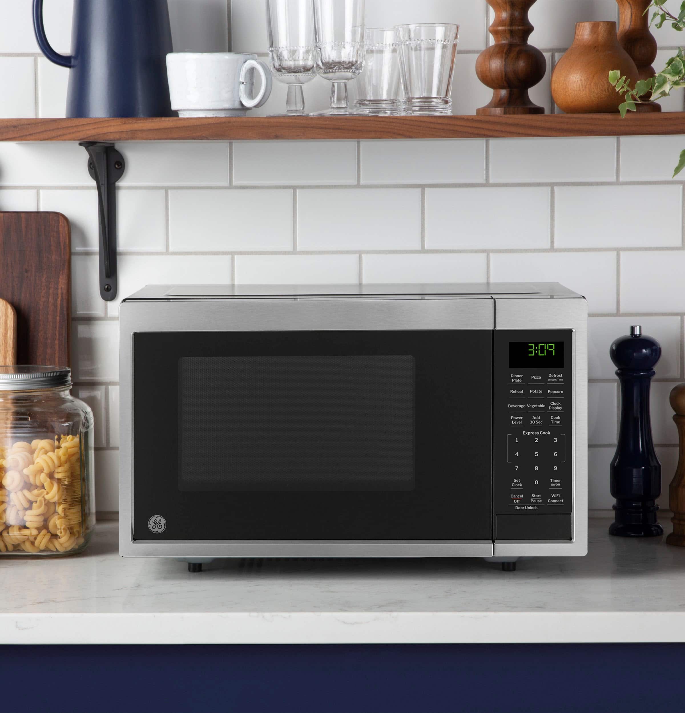 Alt View 27. GE - 0.9 Cu. Ft. Countertop Microwave with Scan-to-Cook Technology - Stainless Steel.