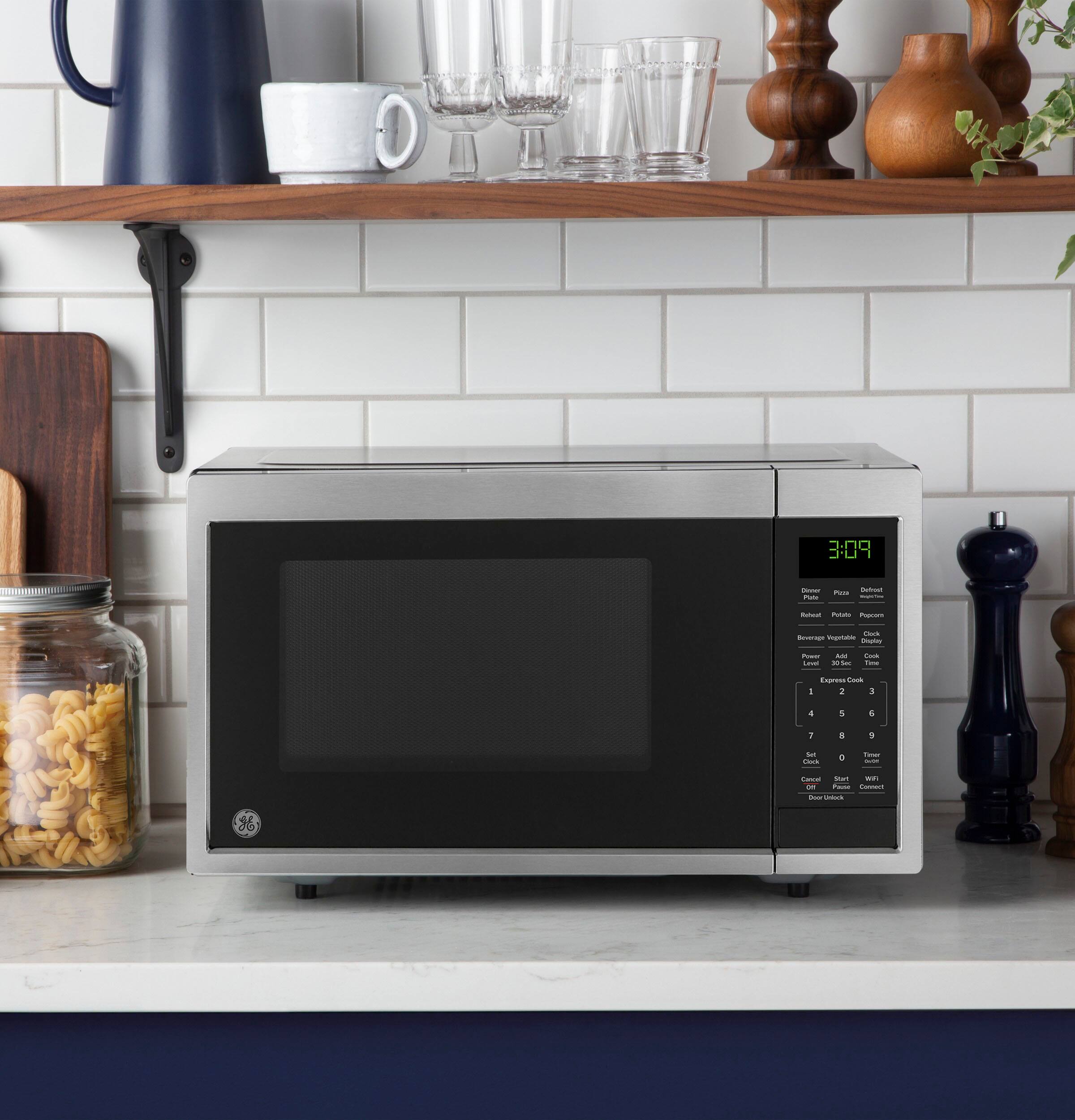 Alt View 27. GE - 0.9 Cu. Ft. Countertop Microwave with Scan-to-Cook Technology - Stainless Steel.