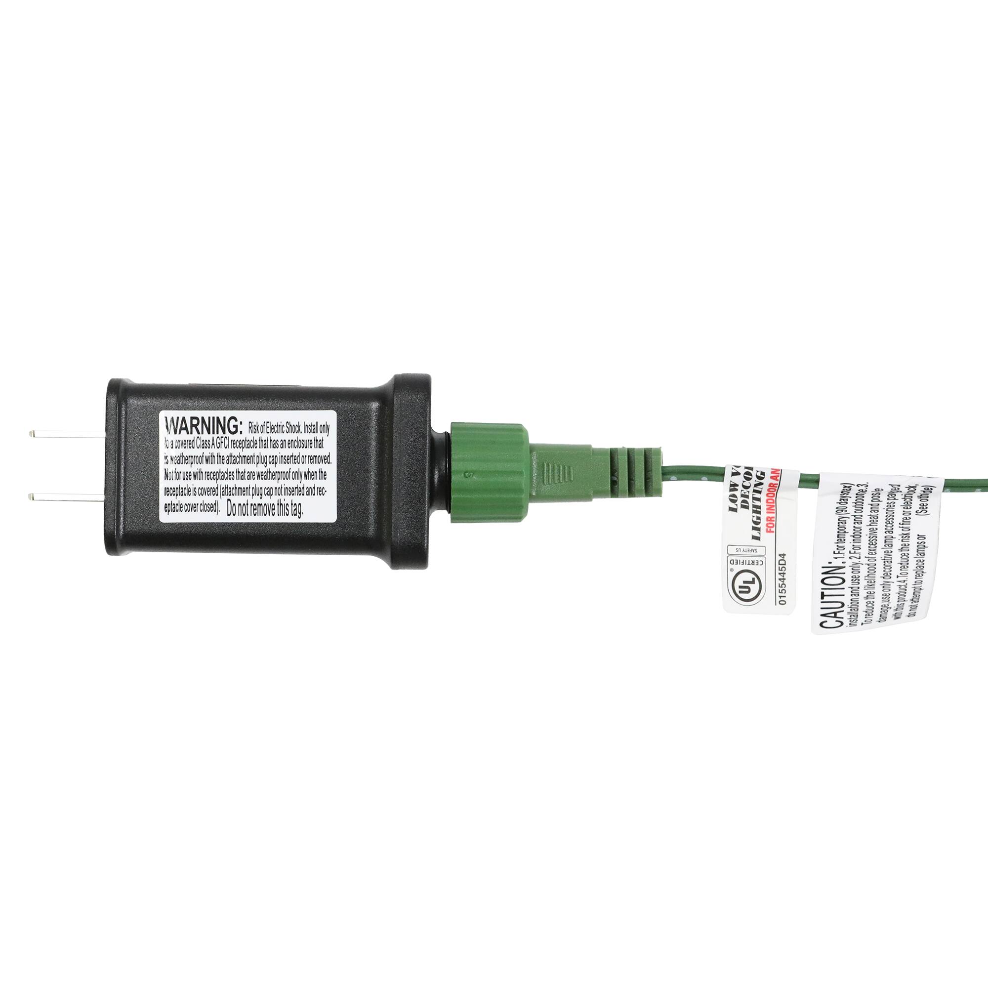 WARNING: Risk of Electric Shock. Install only in a grounded (earthed) outlet. Do not remove this tag.

A N L O W V O L T A G E L I G H T I N G F O R I N D O O R U S E

3. Do not use with receptacles that are weatherproof only when the receptacle cover is closed. Do not remove this tag.

CAUTION: For temporary use only. Do not use for permanent installation.