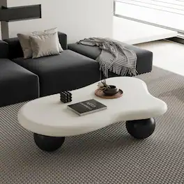 Loheer - 47 Inch Modern Cloud Shaped Coffee Table White Top Black Legs - Black White