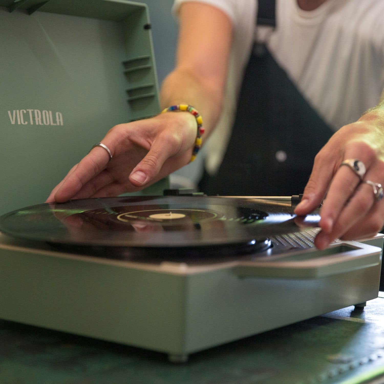 Alt View Zoom 22. Victrola - Re-Spin Sustainable Bluetooth Suitcase Record Player - Basil Green.