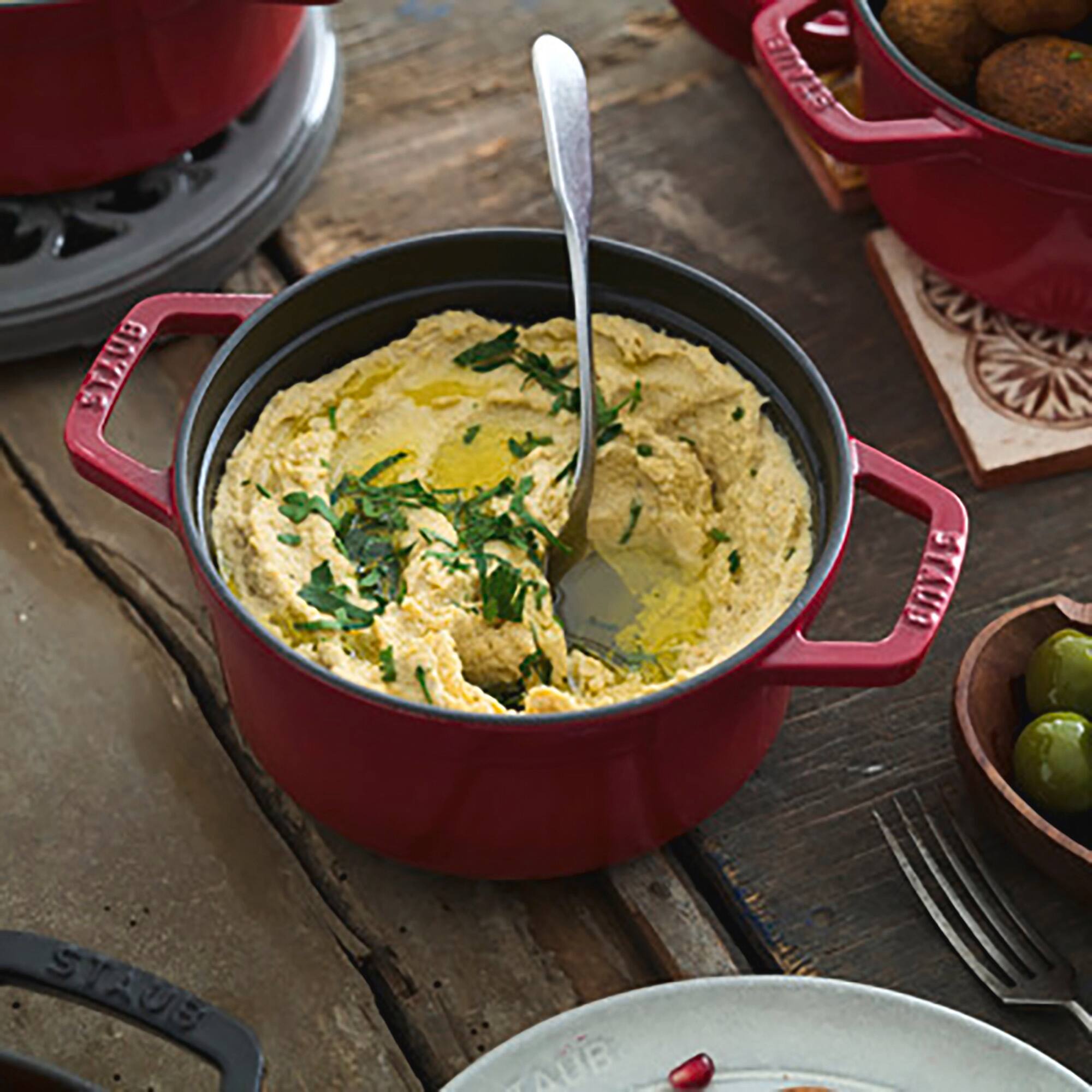 The text on the image reads: "STAUB"