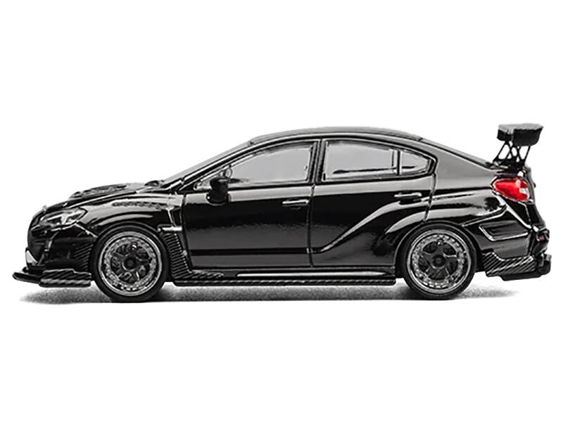Left. CM Models - Subaru VAB WRX S4 Widebody Black Metallic with Red Interior with Extra Wheels 1/64 Diecast Model Car by CM Model - Black Metallic.