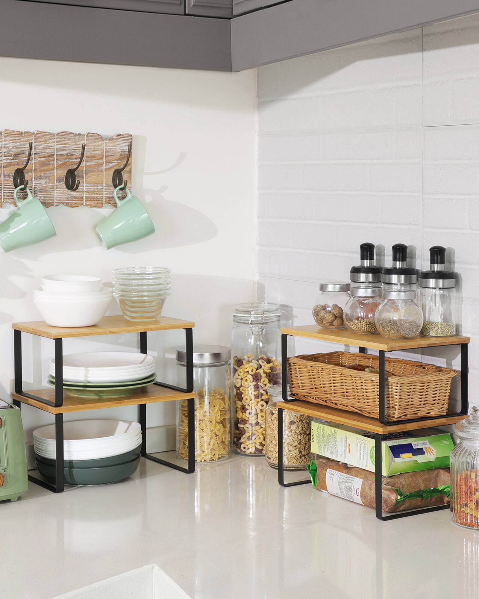 Angle. Songmics Home - Cabinet Organizer Shelf, Set of 4 Kitchen Counter Shelves, Kitchen Storage, Spice Rack, Stackable, Expandable - Ink Black and Natural Beige.