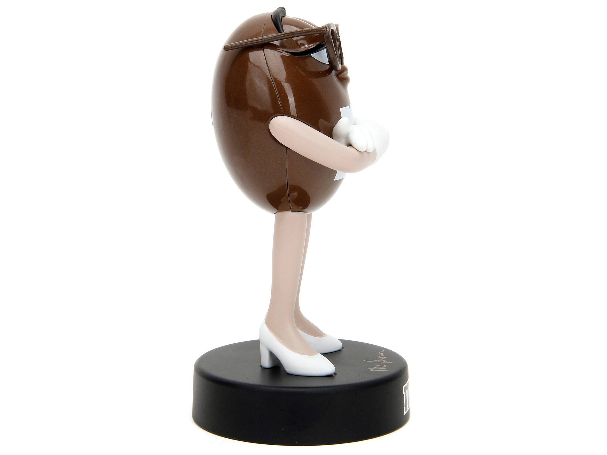 Left. Jada - Brown M&M's 4" Diecast Figurine "Metalfigs" Series by Jada - Brown.