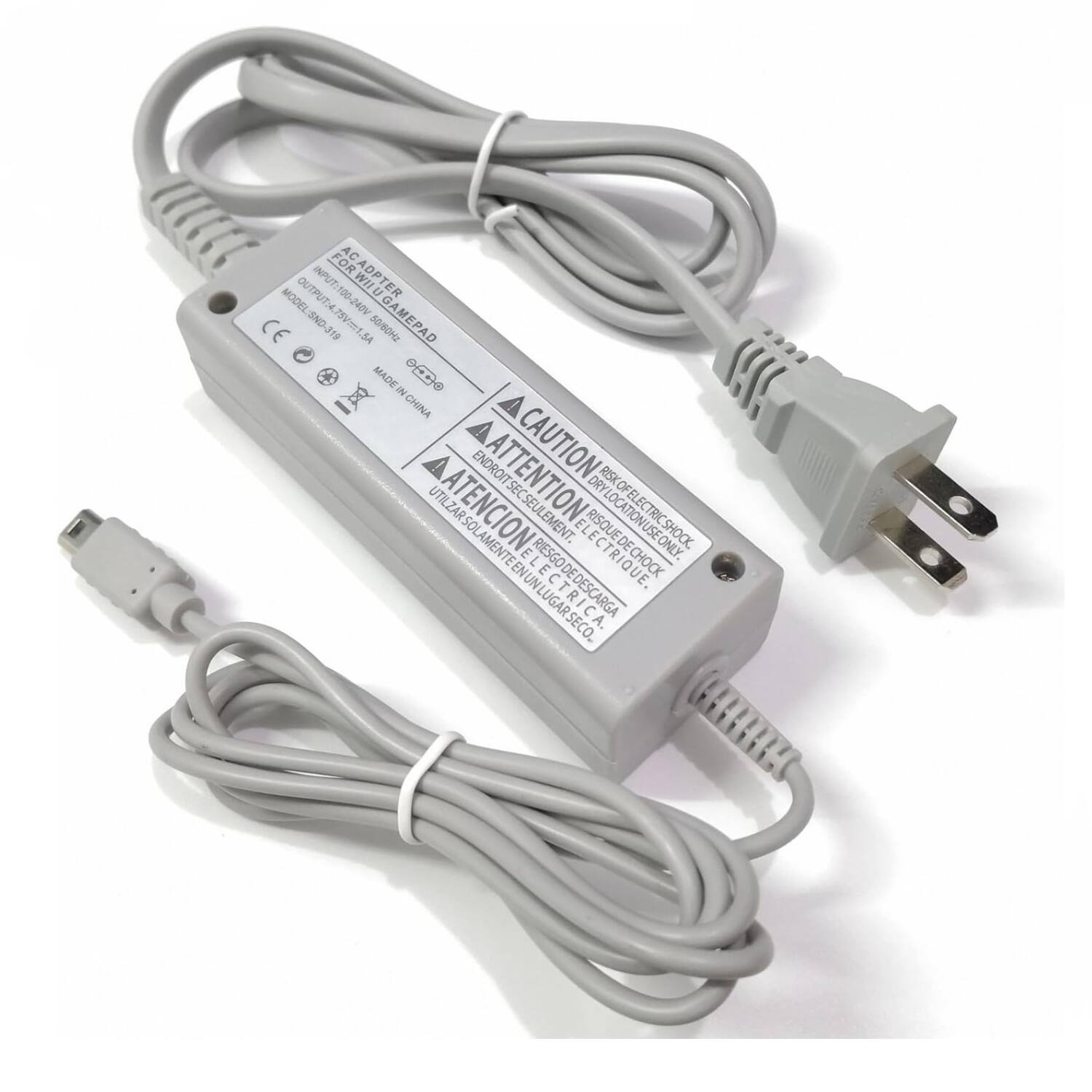 Sure, here is the corrected and grouped text from the image:

---

**ADAPTER FOR GAMEPAD**

**MODEL: SND-319**

**INPUT: 100-240V 50/60Hz**

**OUTPUT: 5V 2A**

**MADE IN CHINA**

**CAUTION ATTENTION RISQUE D'ÉLECTRICITÉ**

**ATTENTION: RISQUE D'ÉLECTRICITÉ**

**CAUTION: ELECTRIC SHOCK HAZARD**

**ATTENTION: RISQUE D'ÉLECTRICITÉ**

**ATTENTION: RISQUE D'ÉLECTRICITÉ**

**ATTENTION: RISQUE D'ÉLECTRICITÉ**

**ATTENTION: RISQUE D'ÉLECTRICITÉ**

**ATTENTION: RISQUE D'ÉLECTRICITÉ**

**ATTENTION: RISQUE D'ÉLECTRICITÉ**

**ATTENTION: RISQUE D'ÉLECTRICITÉ**

**ATTENTION: RISQUE D'ÉLECTRICITÉ**

**ATTENTION: RISQUE D'ÉLECTRICITÉ**

**ATTENTION: RISQUE D'ÉLECT