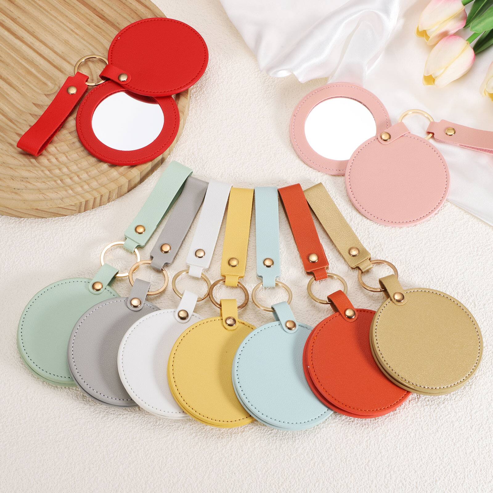 Alt View 3. Unique Bargains - Keychain Mirror, Mini Compact Mirror with PU Leather Cover Round Portable Rotating Folding Keyring for Women - Sky Blue.
