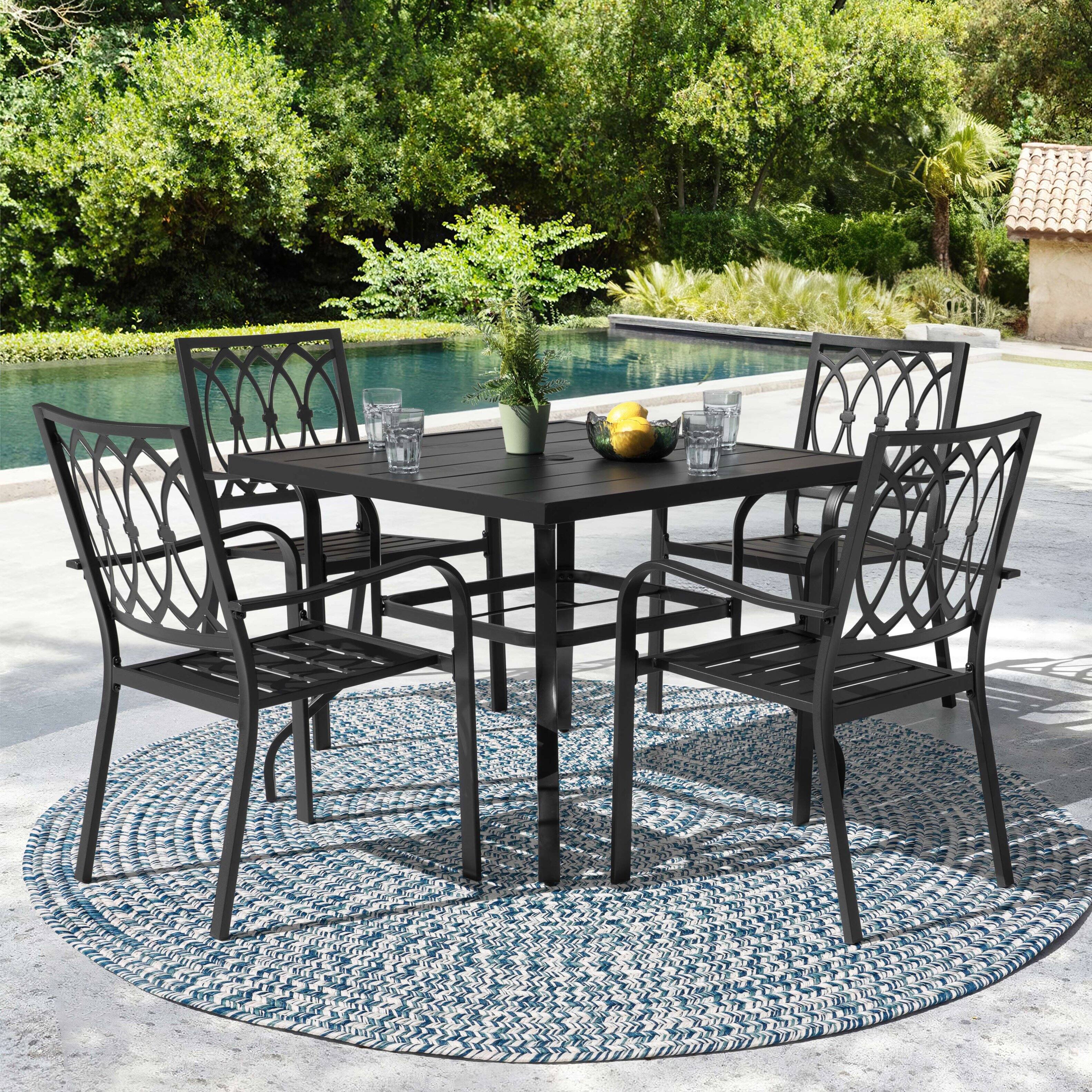 Angle. Nuu Garden - 5-Piece Metal Outdoor Dining Set with Umbrella Hole, 4 Stackable Chairs - Black.