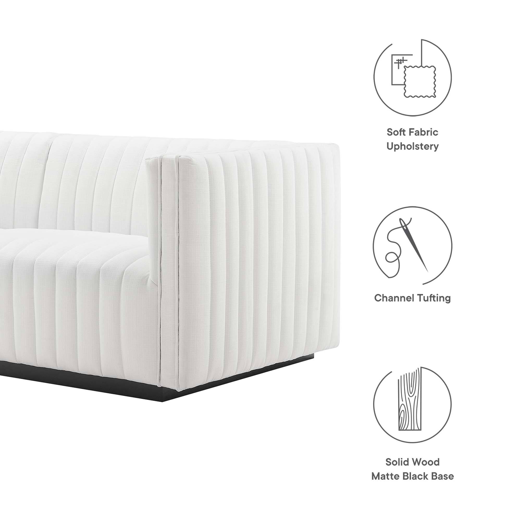 Soft Fabric Upholstery  
Channel Tufting  
Solid Wood Matte Black Base