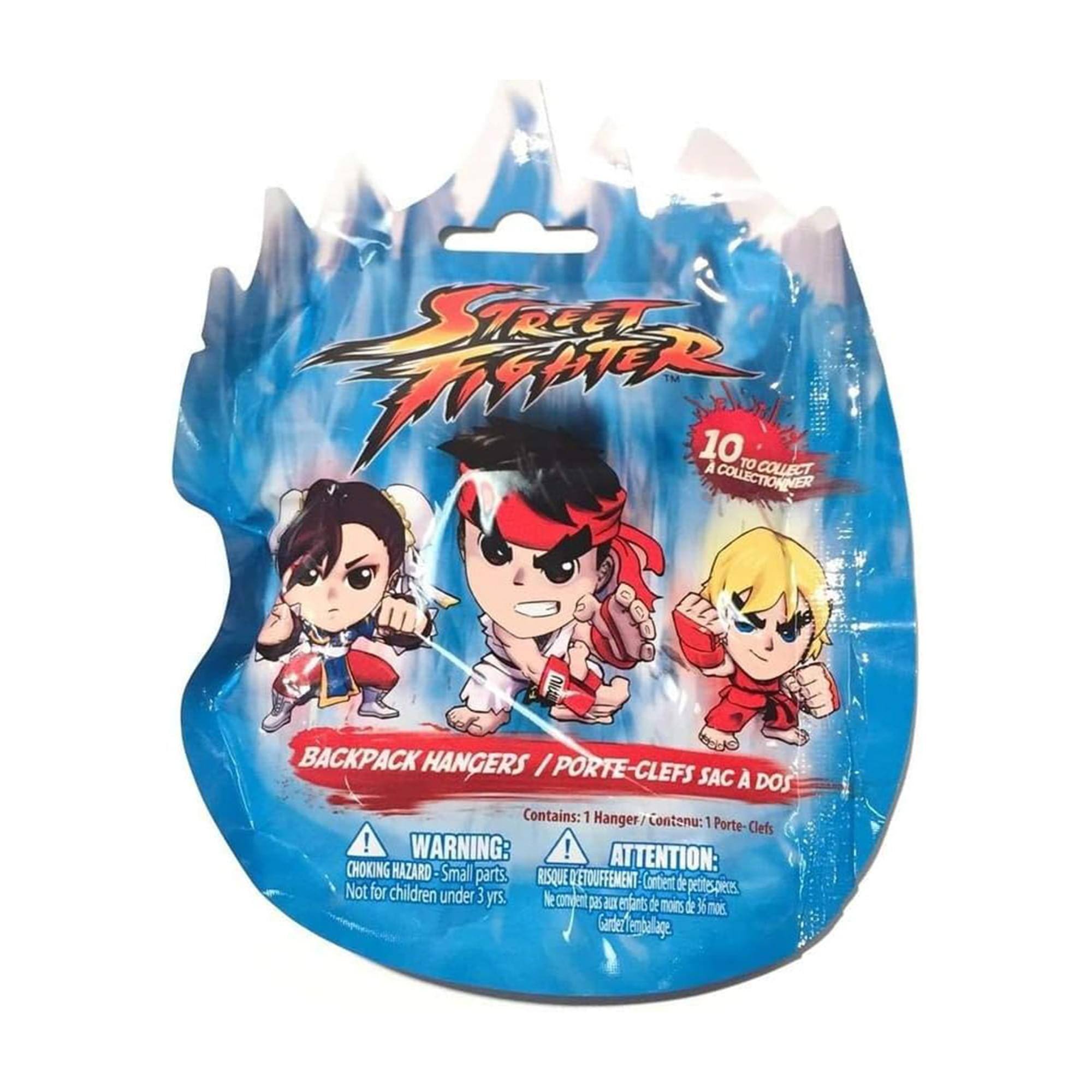 Sure, here is the corrected and grouped text from the image:

---

**Street Fighter**

**10 to Collect / A Collectionner**

**Backpack Hangers / Porte-Clefs Sac à Dos**

**Contains: 1 Hanger / Contenu: 1 Porte-Clefs**

**WARNING: CHOKING HAZARD - Small parts. Not for children under 3 yrs.**

**ATTENTION: RISQUE D'ÉTOUFFEMENT - Contient de petites pièces. Ne convient pas aux enfants de moins de 3 ans. Garder hors de portée des enfants.**

---