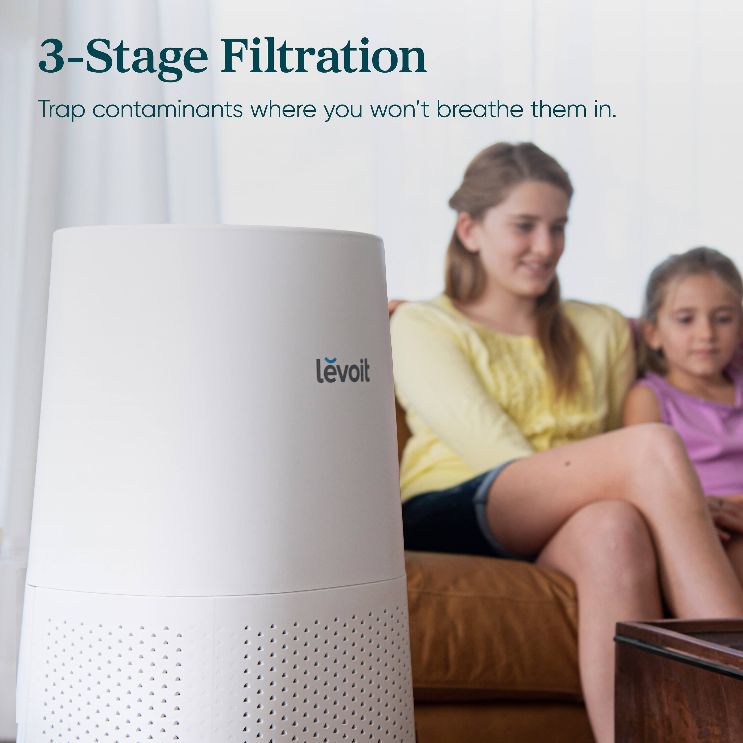 The text on the image is already grouped and correctly written. It reads: "3-Stage Filtration Trap contaminants where you won't breathe them in. levoit."