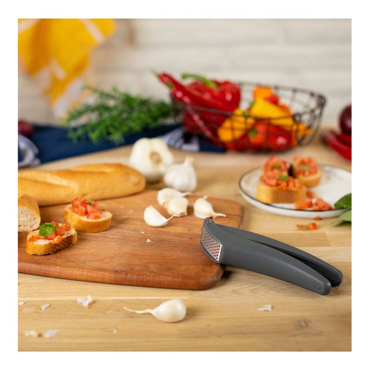 Alt View 1. Kuhn Rikon - 7-Inch Easy-Clean Garlic Press, Red - Red.