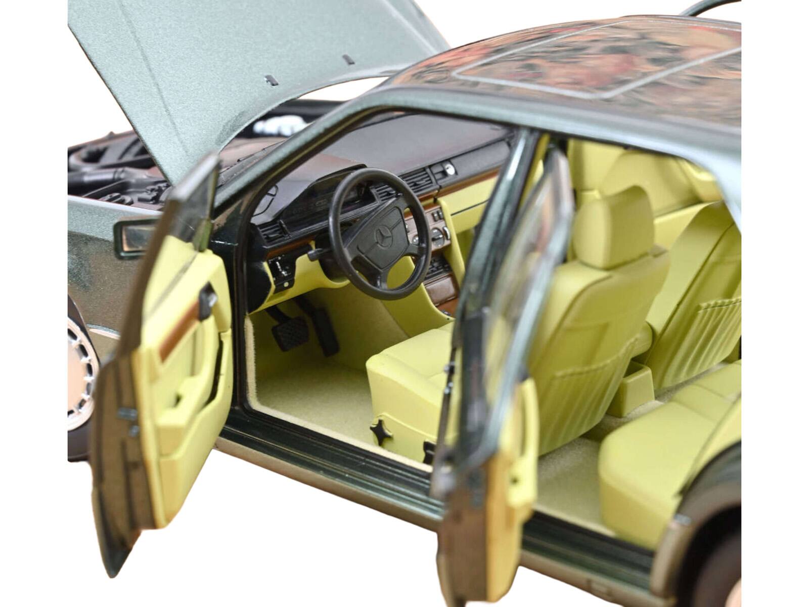 Alt View 3. Norev - 1990 Mercedes-Benz 230 E Night Green Metallic with Green Interior 1/18 Diecast Model by Norev.