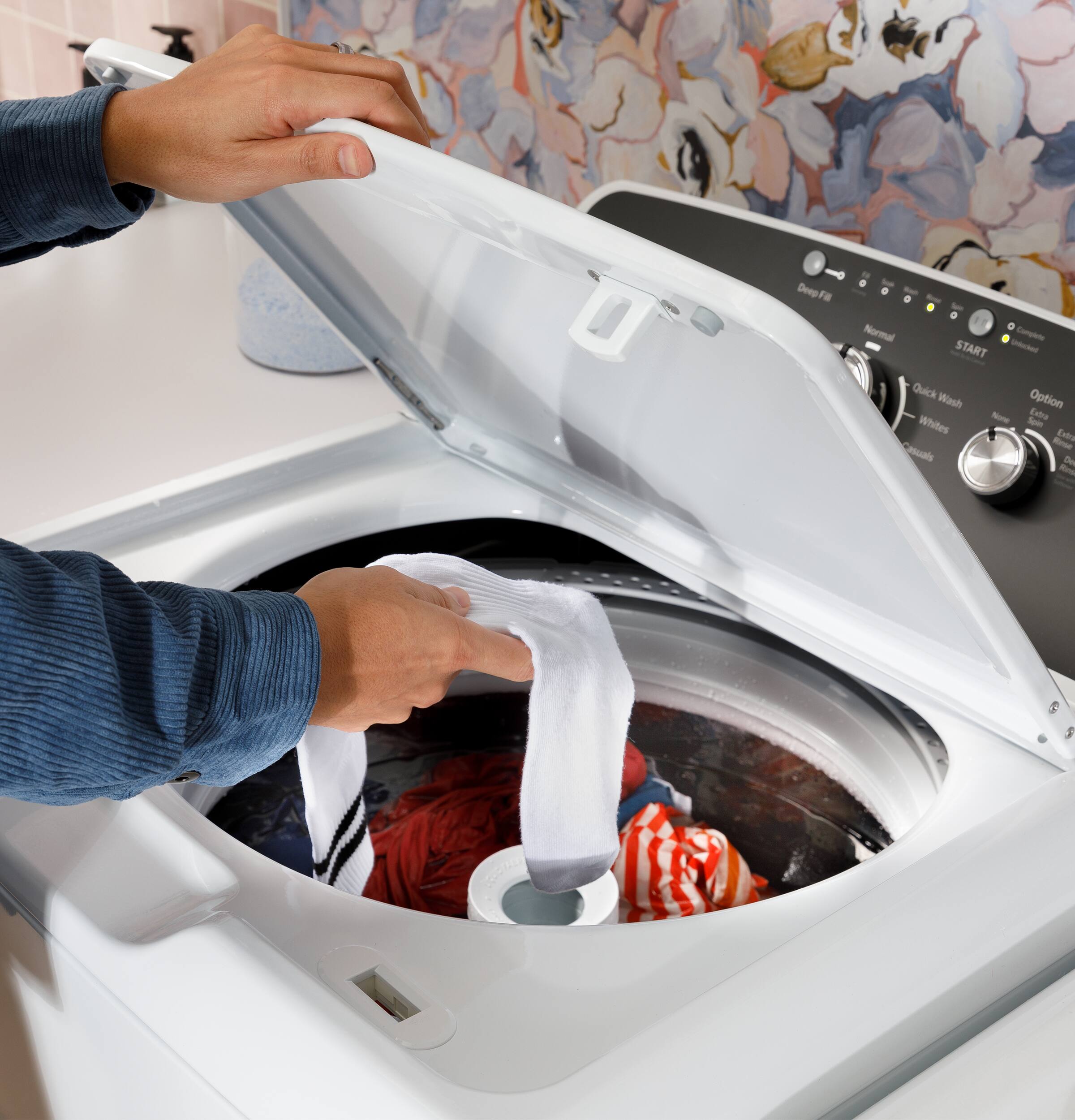 GE GE - 4.3 Cu. Ft. High-Efficiency Top Load Washer with 5 Year Limited Parts and Labor Warranty - White with Black Stainless Steel 9