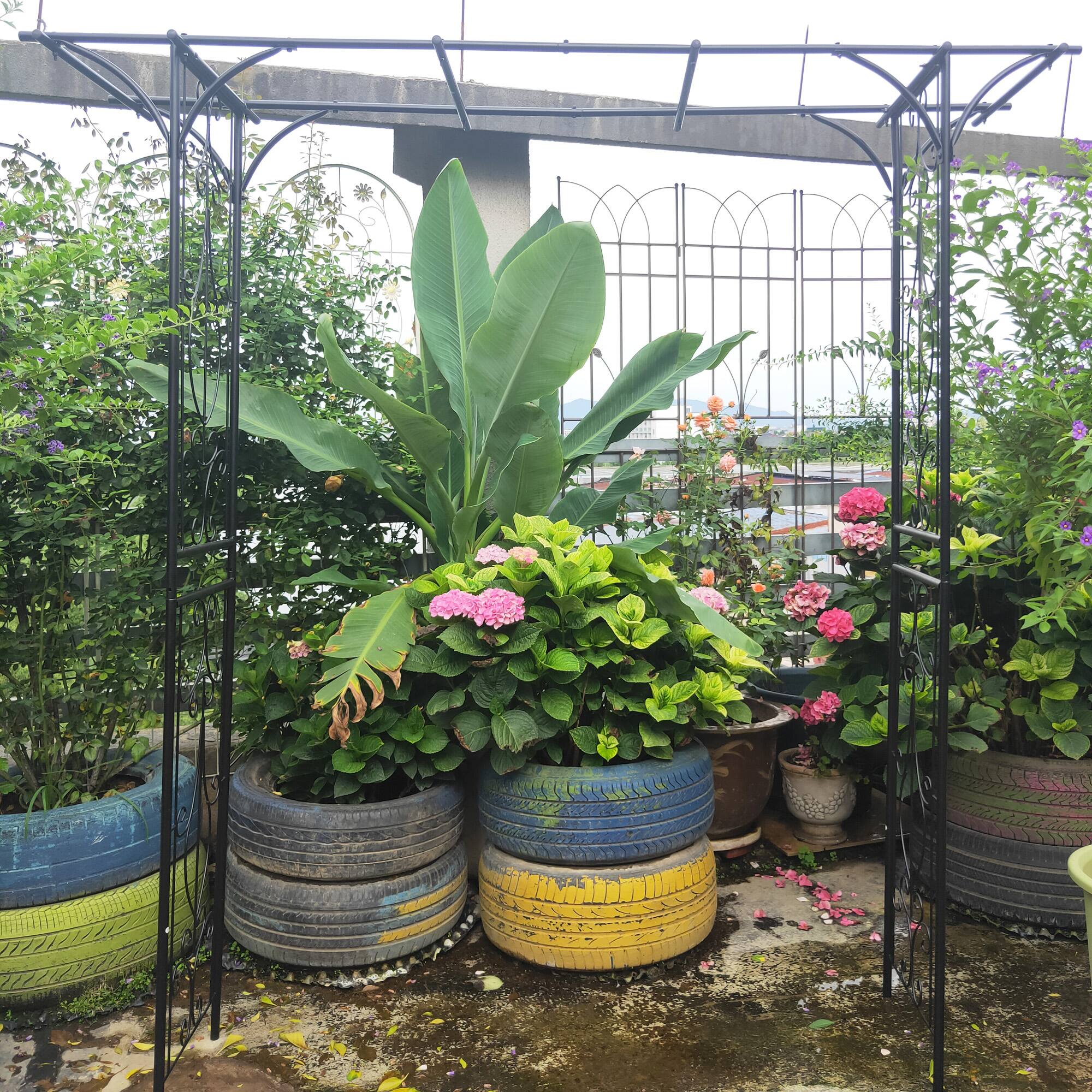 Left. Loheer - 6.69 x 1.71 x 6.76 ft Metal Garden Arch Plant Support Trellis for Outdoor Wedding Garden - Black.