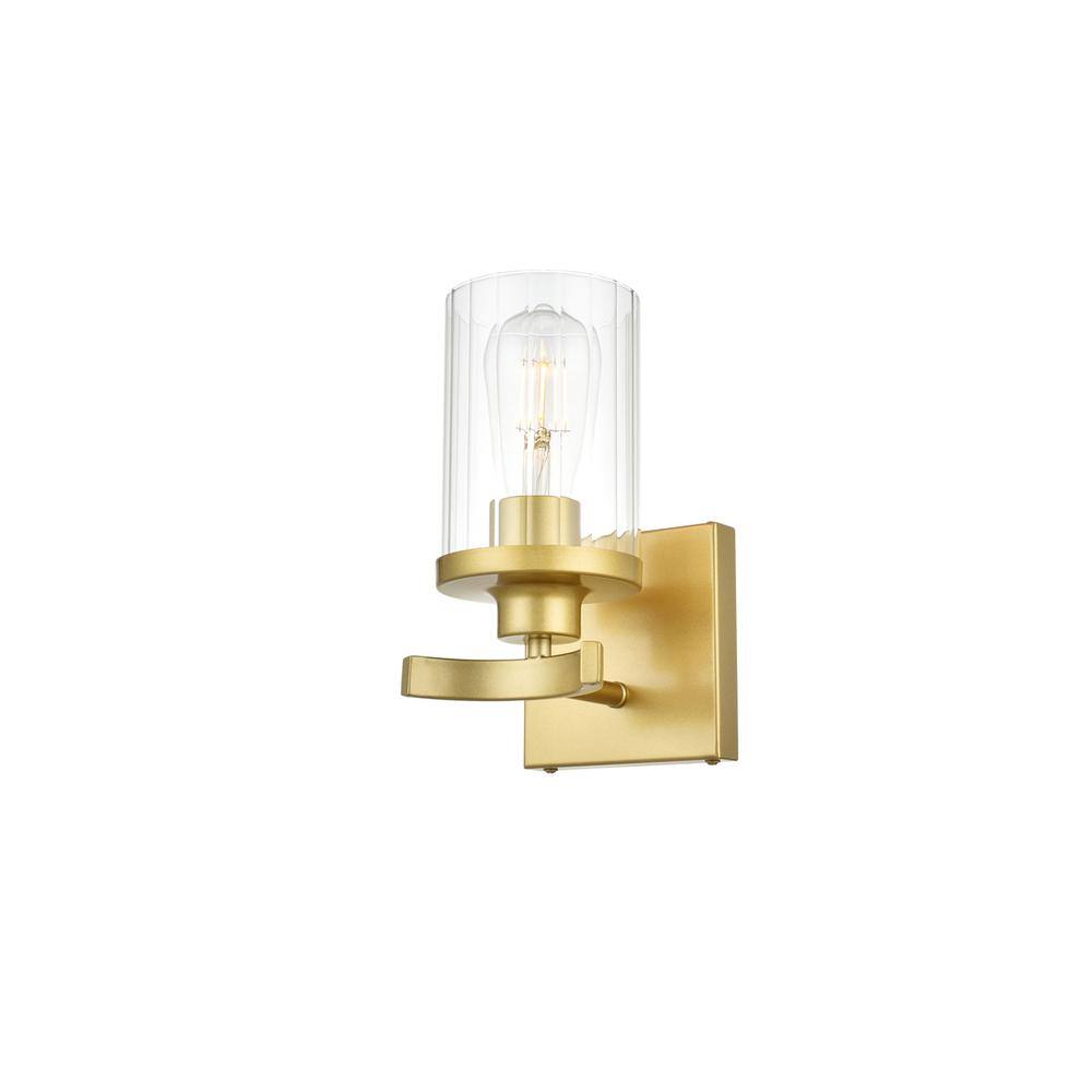 Back. Living District - Saanvi 1 light Brass and Clear Bath Sconce - Brass And Clear.