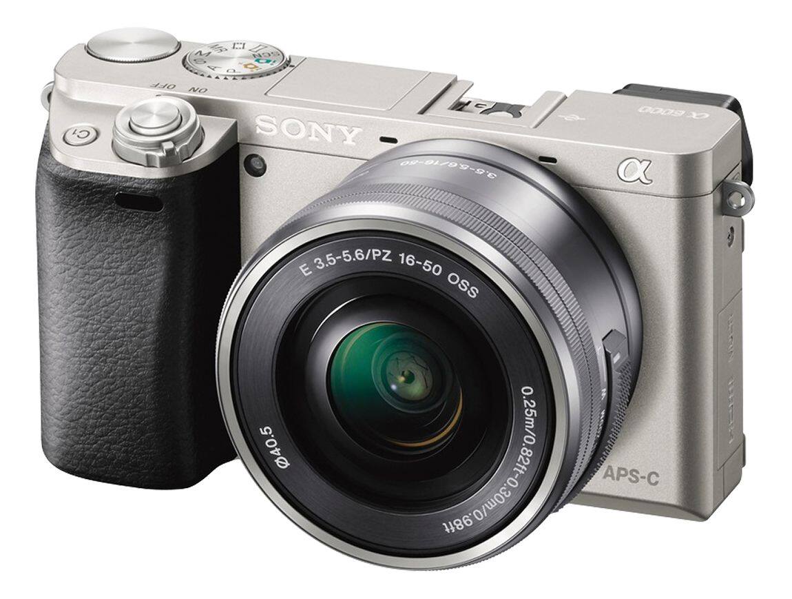 Left. Sony - Alpha a6000 Mirrorless Camera with 16-50mm Retractable Lens - Silver.