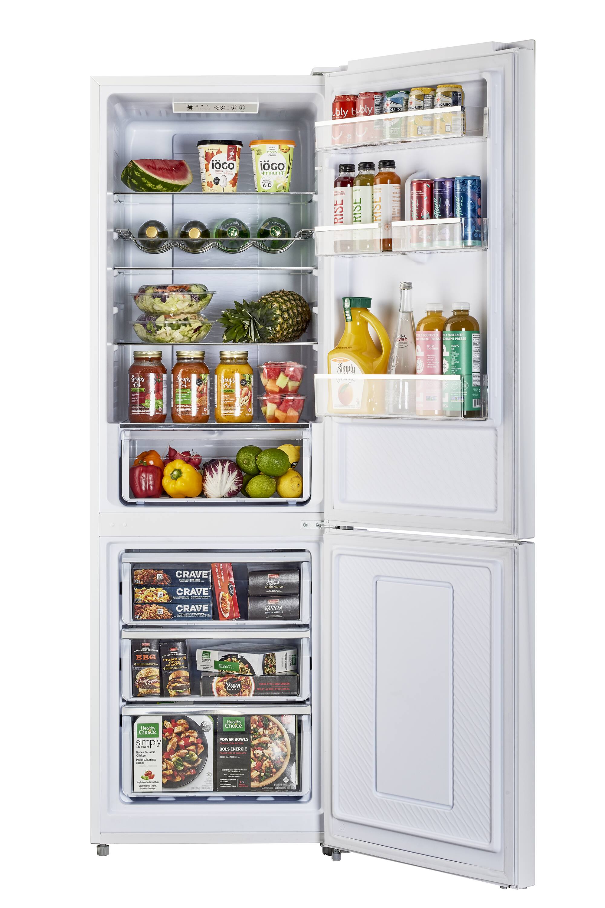 The refrigerator is filled with a variety of food items, including several bottles of drinks, fruits, and vegetables. The drinks are placed in the middle and upper sections of the refrigerator, while the fruits and vegetables are located in the lower section. The refrigerator is well-stocked and offers a diverse selection of food options for consumption.