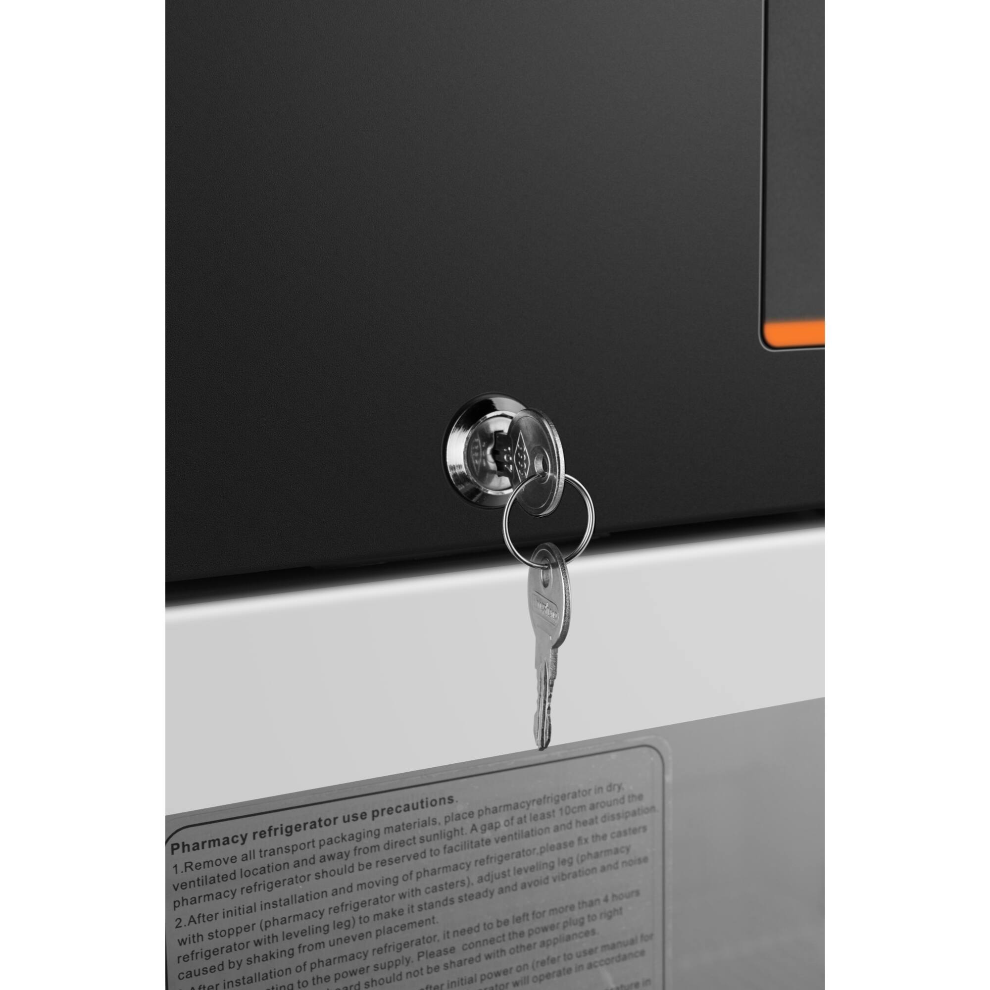 In a dry pharmacy refrigerator, it is essential to use precautions around the use of the appliance. Place the refrigerator at least 10cm away from the wall to ensure proper heat dissipation and avoid direct sunlight. Ensure proper ventilation and casters for easy transportation. Avoid placing the refrigerator in a location where it stands more than 10 hours per day, and avoid placing it on an uneven surface. Make sure to connect the appliance to a power plug with a stopper to prevent it from shaking during operation. Please refer to the user manual for proper installation and use of the refrigerator to avoid any issues caused by improper use or installation.