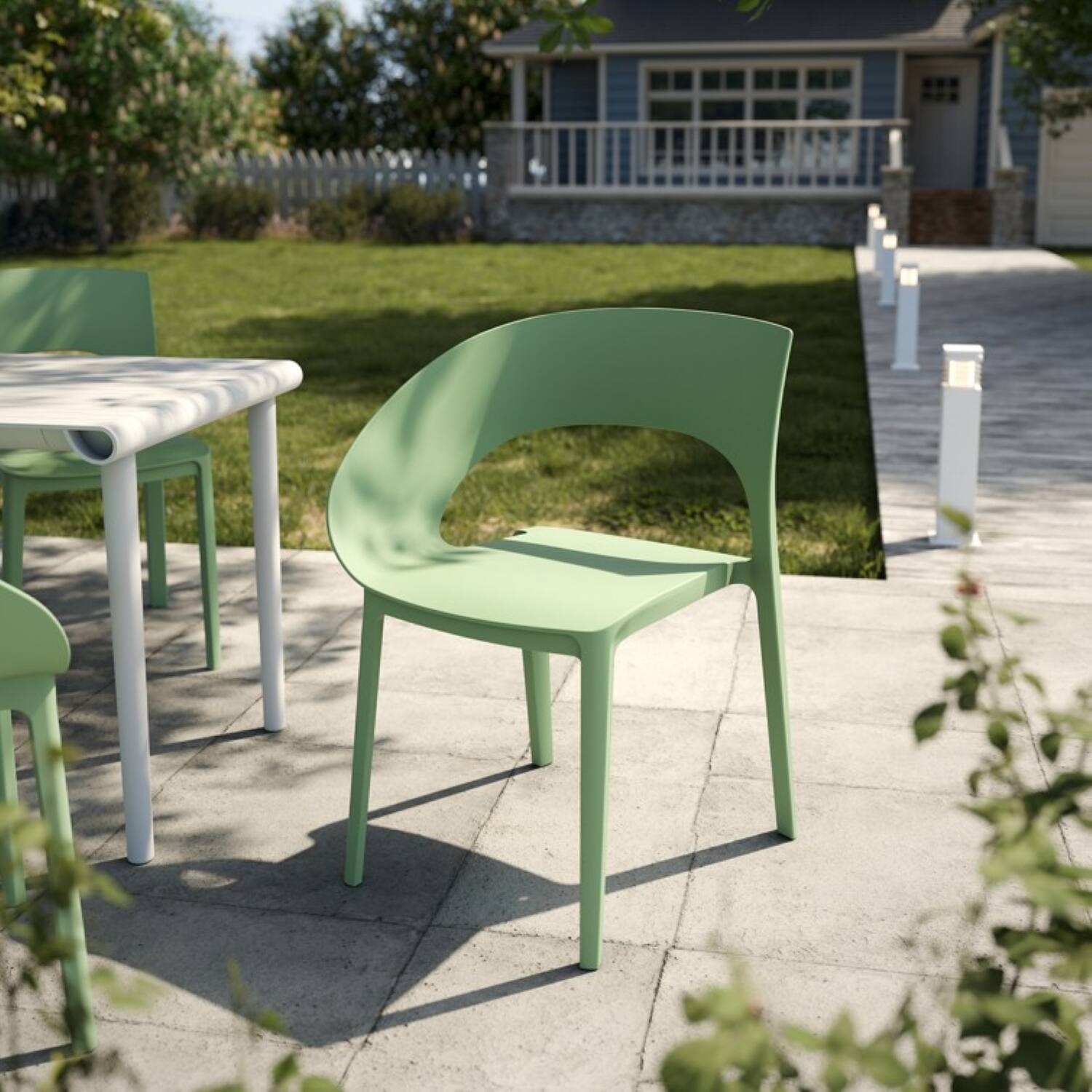 Angle. Mondawe - Set of 4 Polypropylene Single-Side Chair - Haze Green.