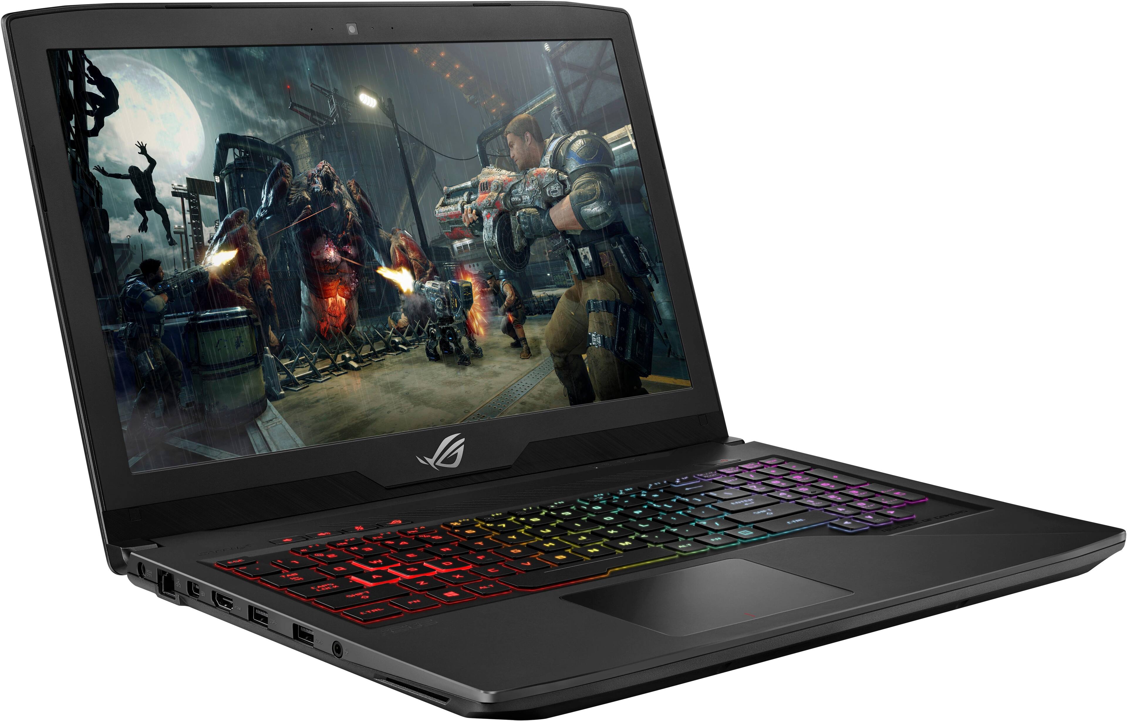 Angle. ASUS - 15.6" Laptop - Intel Core i7 - 16GB Memory - NVIDIA GeForce GTX 1060 - 1TB Hard Drive + 128GB Solid State Drive - Soft touch black.