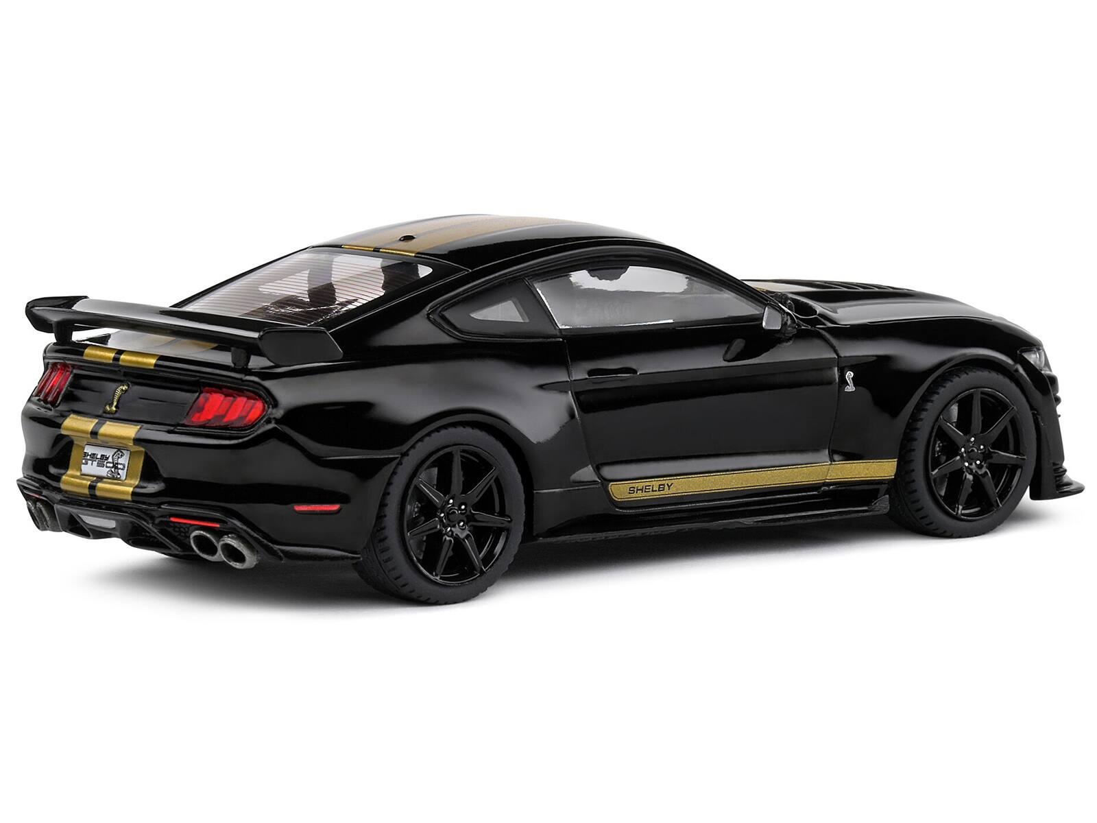 Left. Solido - 2020 Shelby Mustang GT500 Black with Gold Stripes 1/43 Diecast Model Car by Solido - Black with Gold.