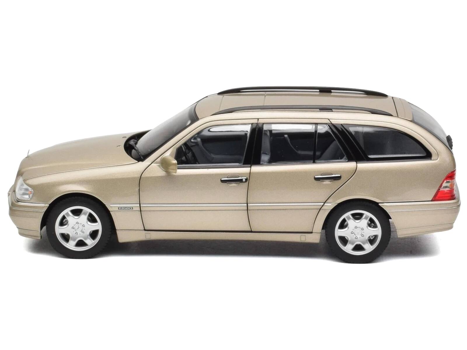 Left. Norev - 1997 Mercedes-Benz C-Class T-Model Smoke Silver Metallic 1/18 Diecast Model Car by Norev - Silver Metallic.