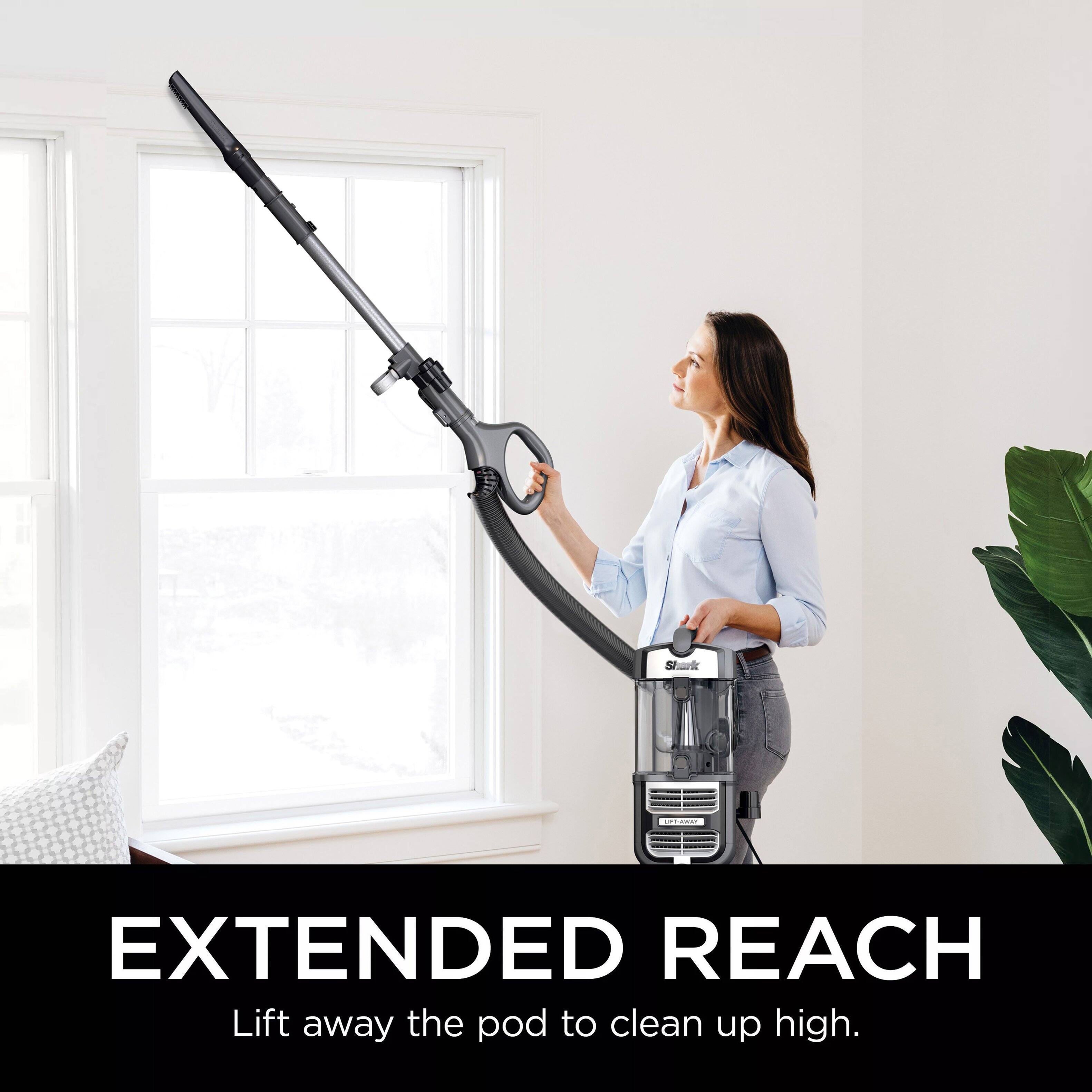 EXTENDED REACH Lift away the pod to clean up high.