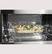 Alt View 13. GE Profile - 1.7 Cu. Ft. Convection Over-the-Range Microwave with Sensor Cooking - Black Stainless Steel.