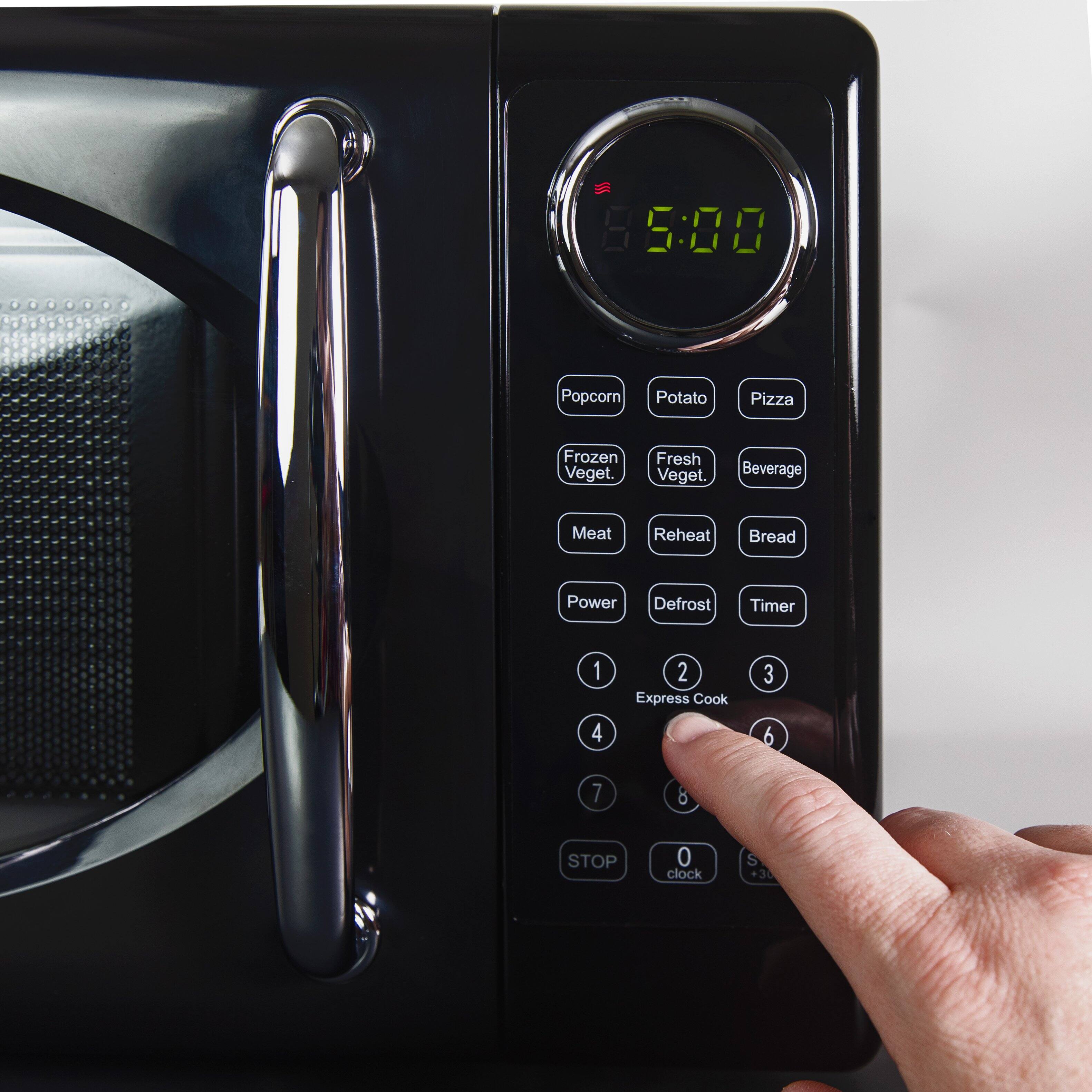 S 5:00  
Popcorn Potato Pizza Frozen Veget. Fresh Veget. Beverage Meat Reheat Bread Power Defrost Timer  
1 4 2 Express Cook 3 6 7 8 STOP 0 clock S +30