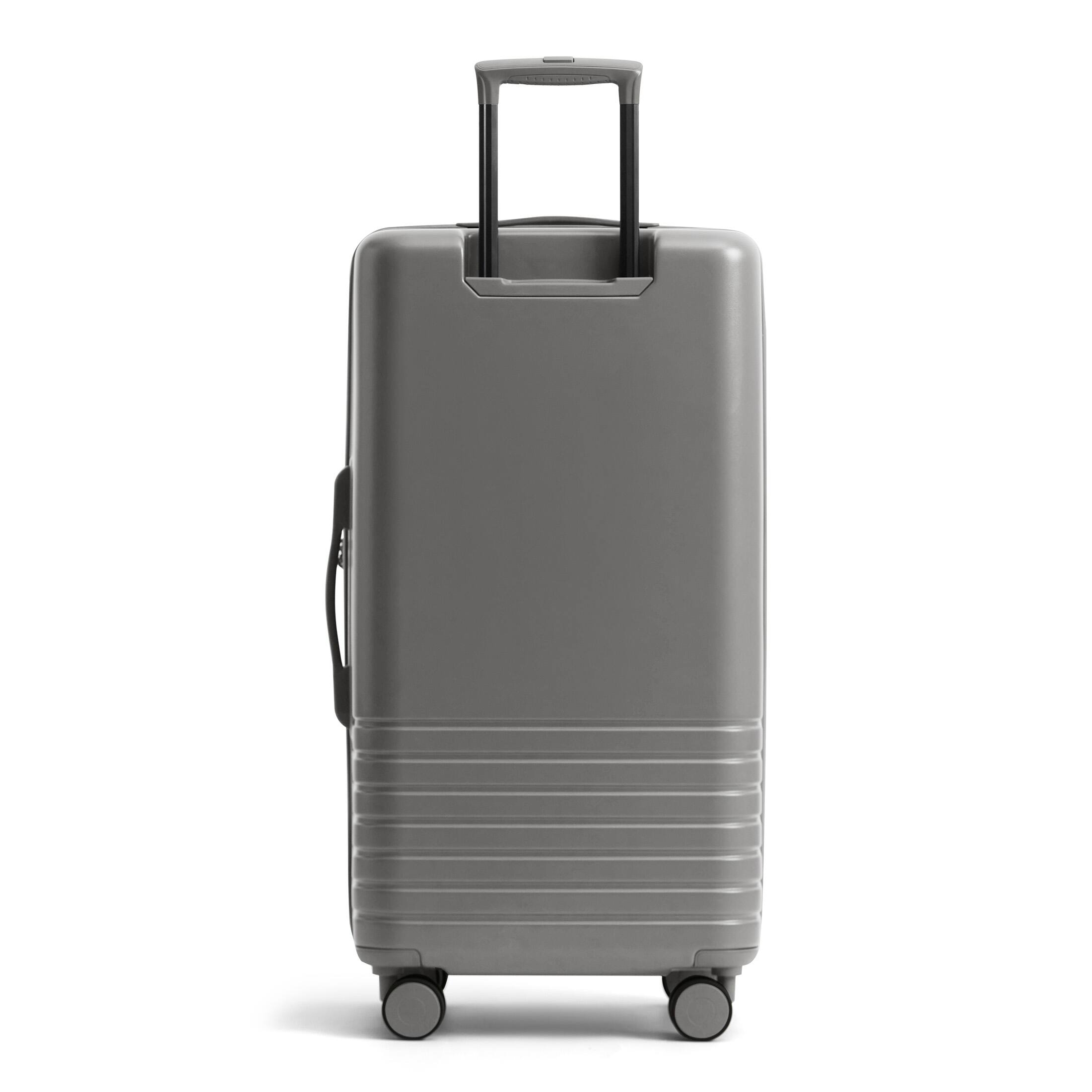 Angle. Bagsmart - Getaway 30" Trunk Checked Luggage, Large Hardside Suitcase with Built-in Scale & 360 Double Spinner Wheels - Dark Charcoal Gray.