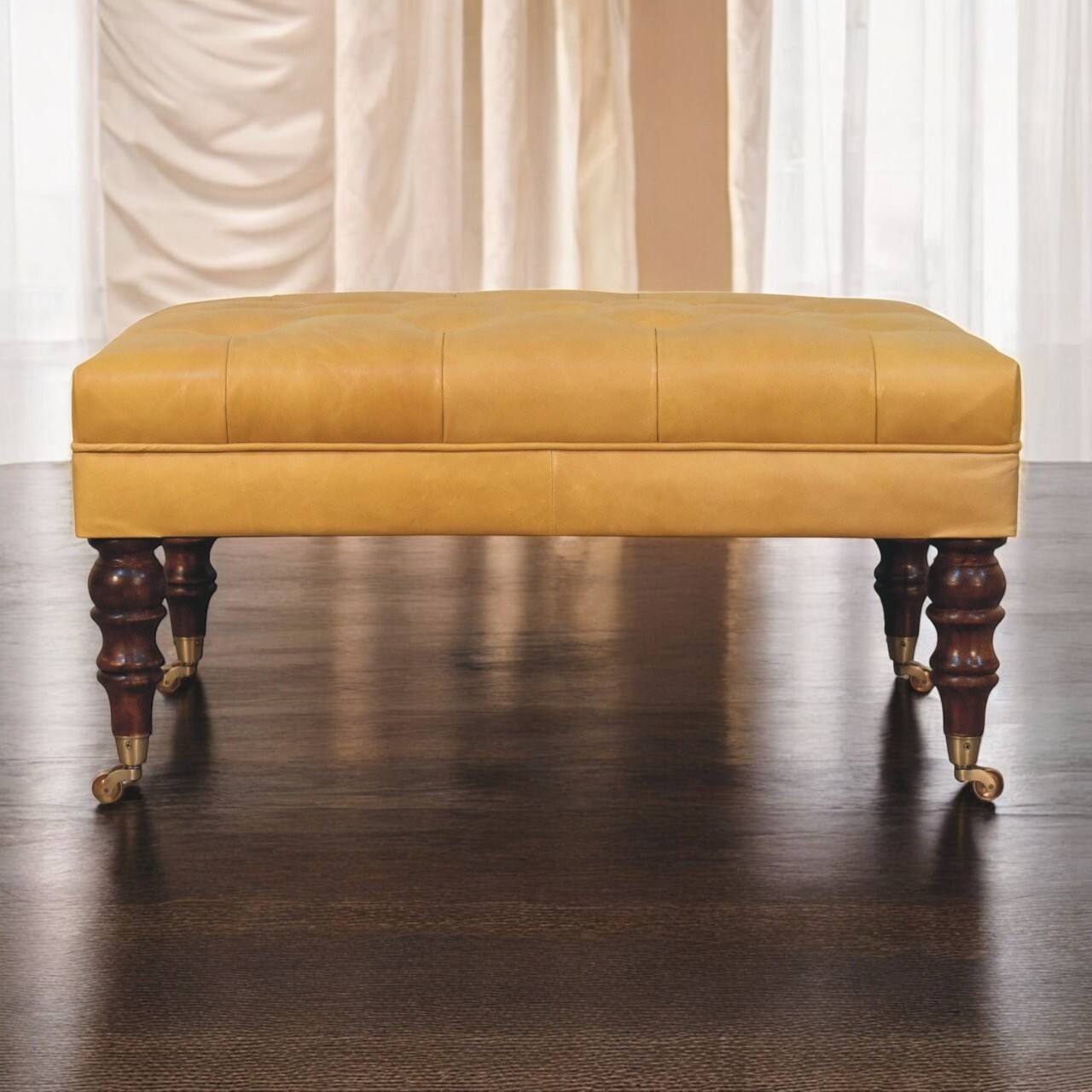 Angle. Artisan Furniture - Artisan Furniture Solid Wood Honey Caramel Buffalo Tan Leather Ottoman with Castor Legs, Upholstered, Yellow & Brown - Brown & Yellow.