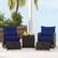 Alt View 4. Costway - 5 PCS Patio Rattan Furniture with 2 Wicker Ottomans & Tempered Glass Coffee Table - Navy + Mix Brown.