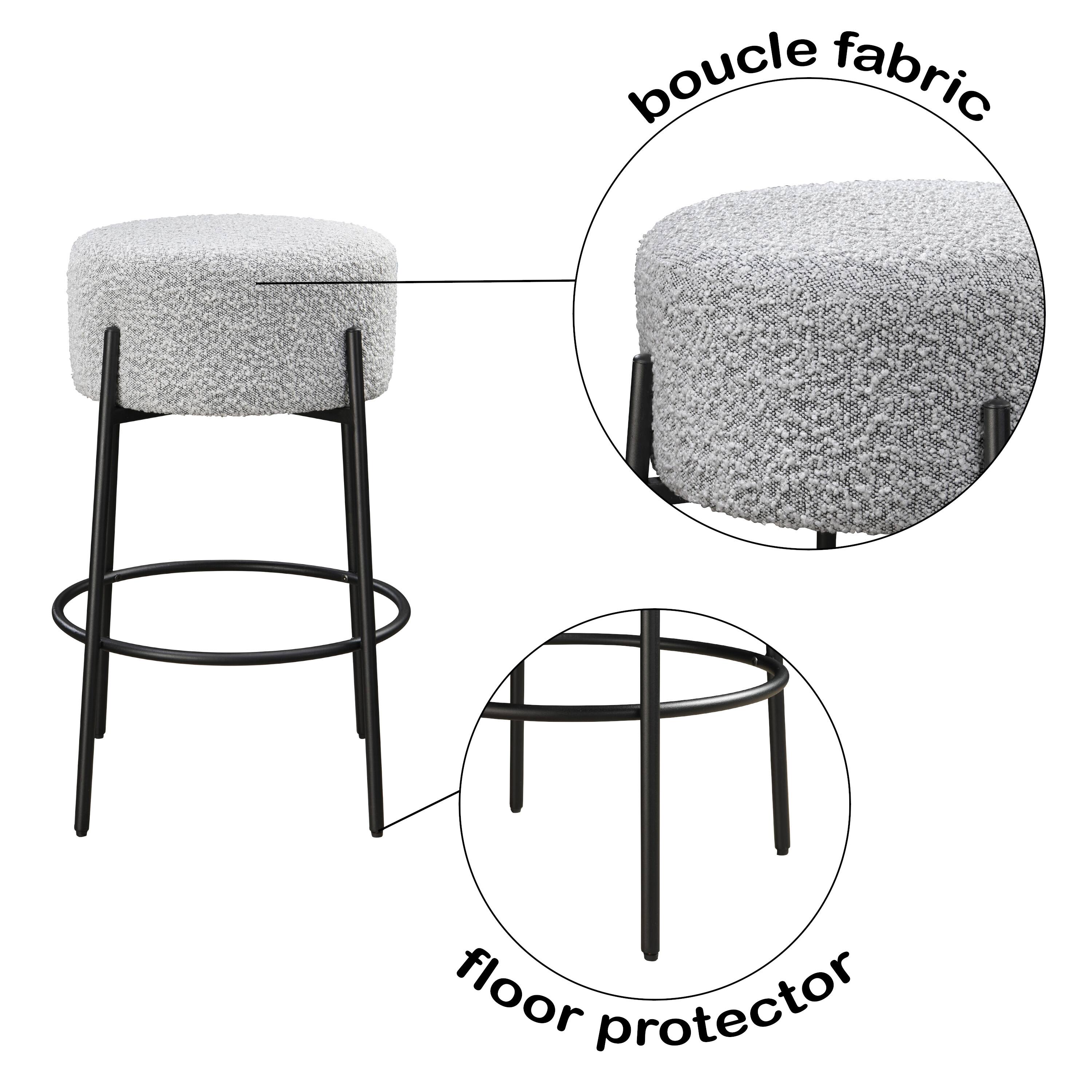 The corrected text is: "boucle fabric floor protector."