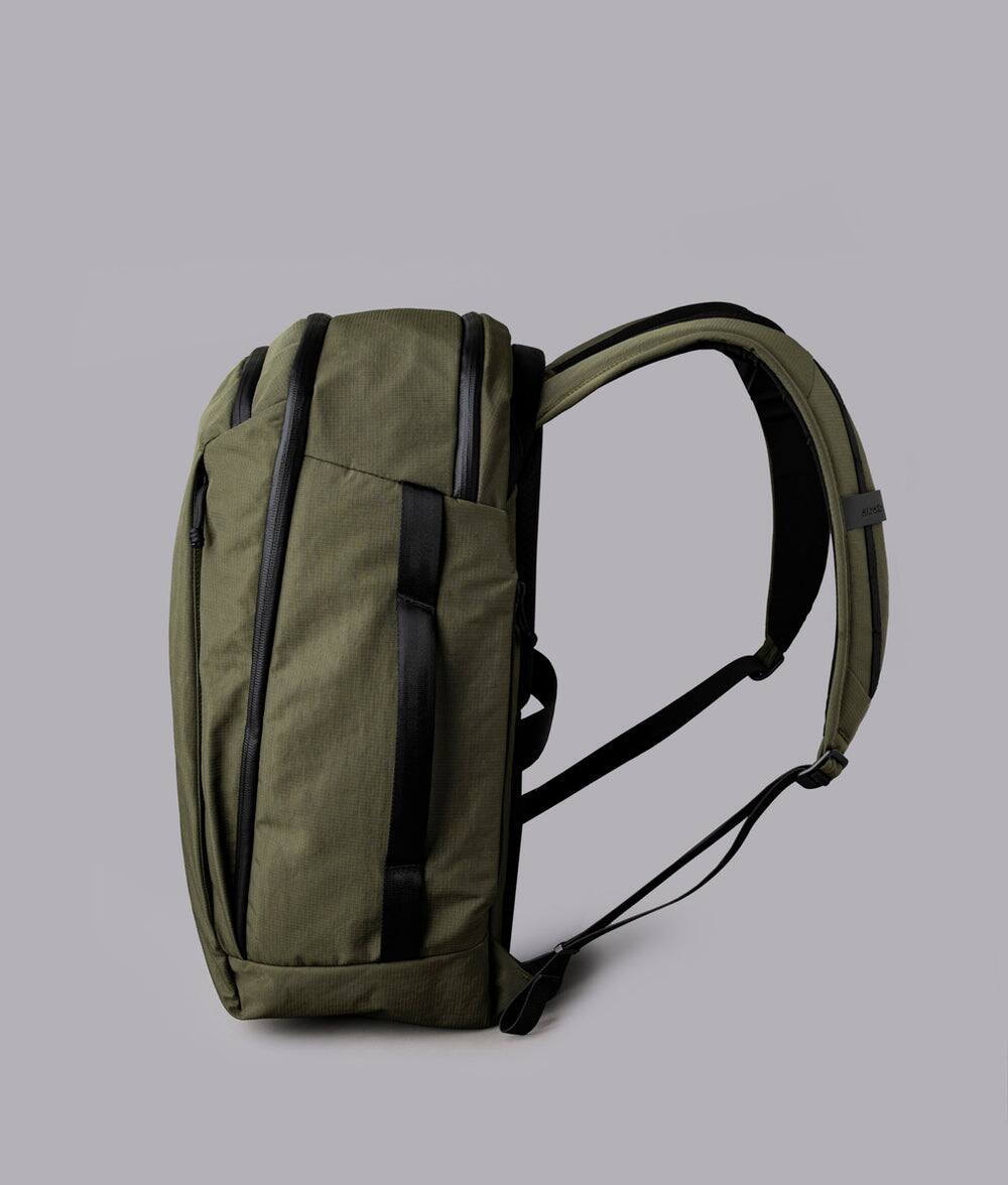 Left. ALPAKA - Traverse Backpack 30L & Flight Pouch Pro  Bundle,16" Laptop Travel Backpack with Quick-Access Passport Pocket - Green Axoflux 400D Ripstop Nylon.