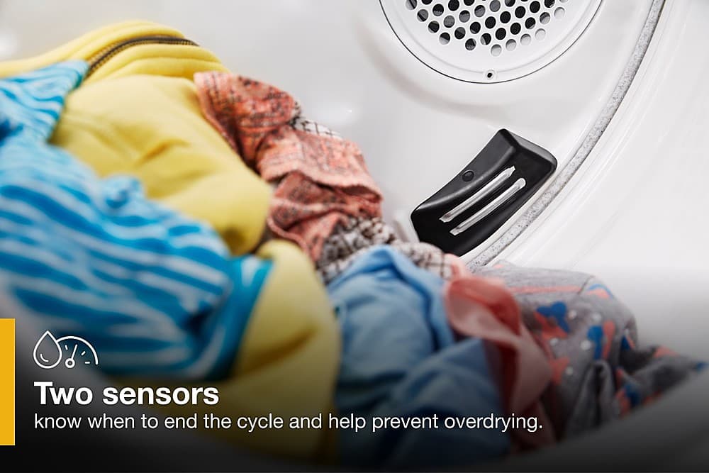 The image shows a washing machine filled with clothes, indicating that it is in the process of drying. The text "Two sensors know when to end the cycle and help prevent overdrying" suggests that the washing machine is equipped with technology that helps to determine when the drying cycle is complete and prevents overdrying of the clothes. This helps to ensure that the clothes are dried efficiently and maintain their quality.