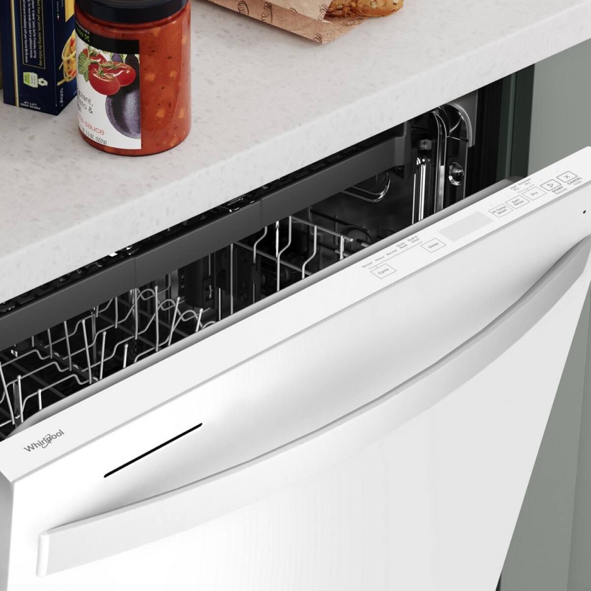 - A bottle of "Plant Based Tomato Sauce"
- A box of "Whirlpool" dishwasher detergent
- A Whirlpool dishwasher
- A piece of ginger on a wooden board