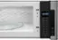 The text on the image reads: "When using cleaning agents or detergents, always read and follow the label instructions. Carefully measure the amount of cleaning product needed for the size of the load. Use the appropriate setting on the microwave for the type of food being heated. 12:20."