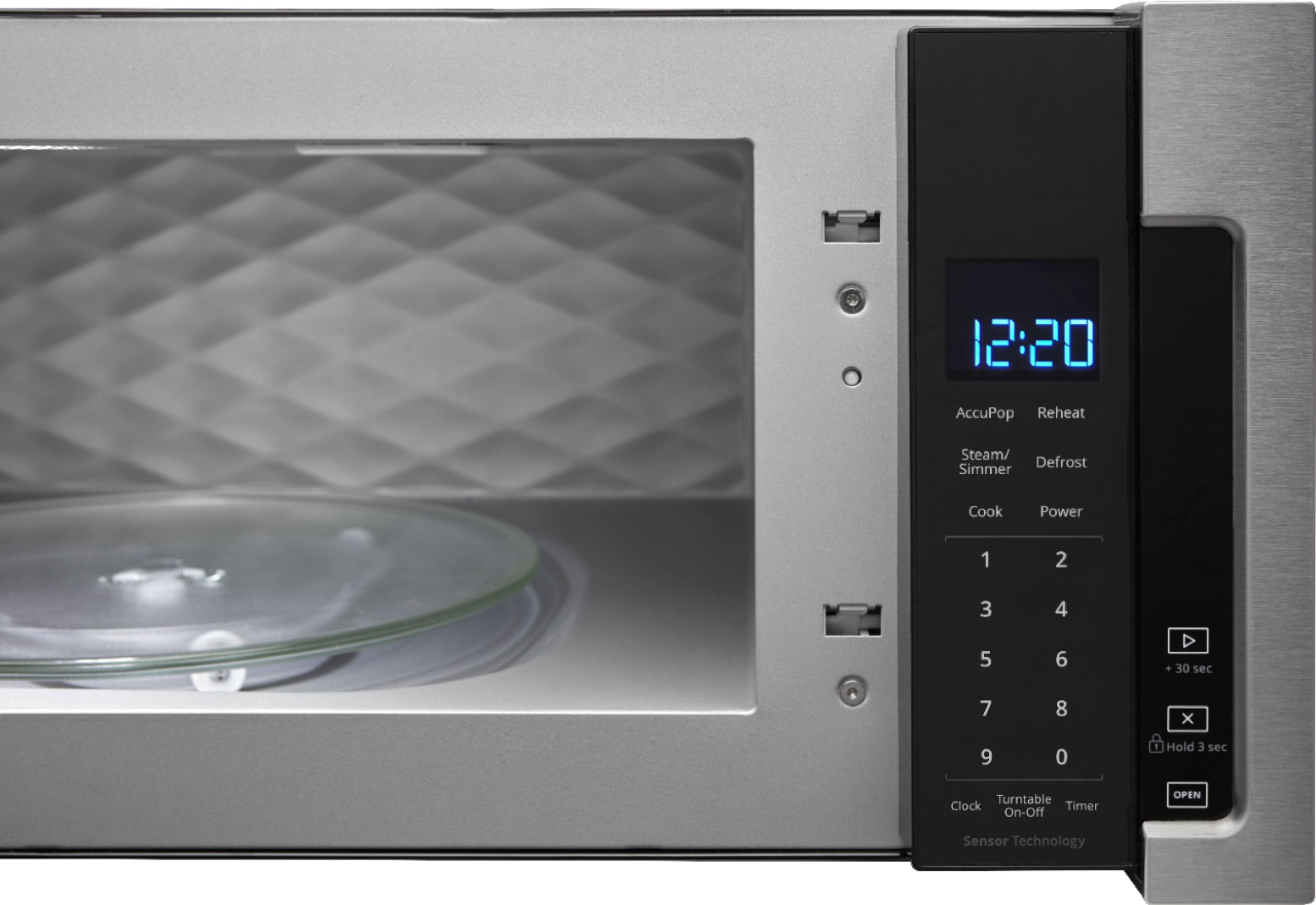 Left. Whirlpool - 1.1 Cu. Ft. Low Profile Over-the-Range Microwave Hood Combination - Stainless Steel.
