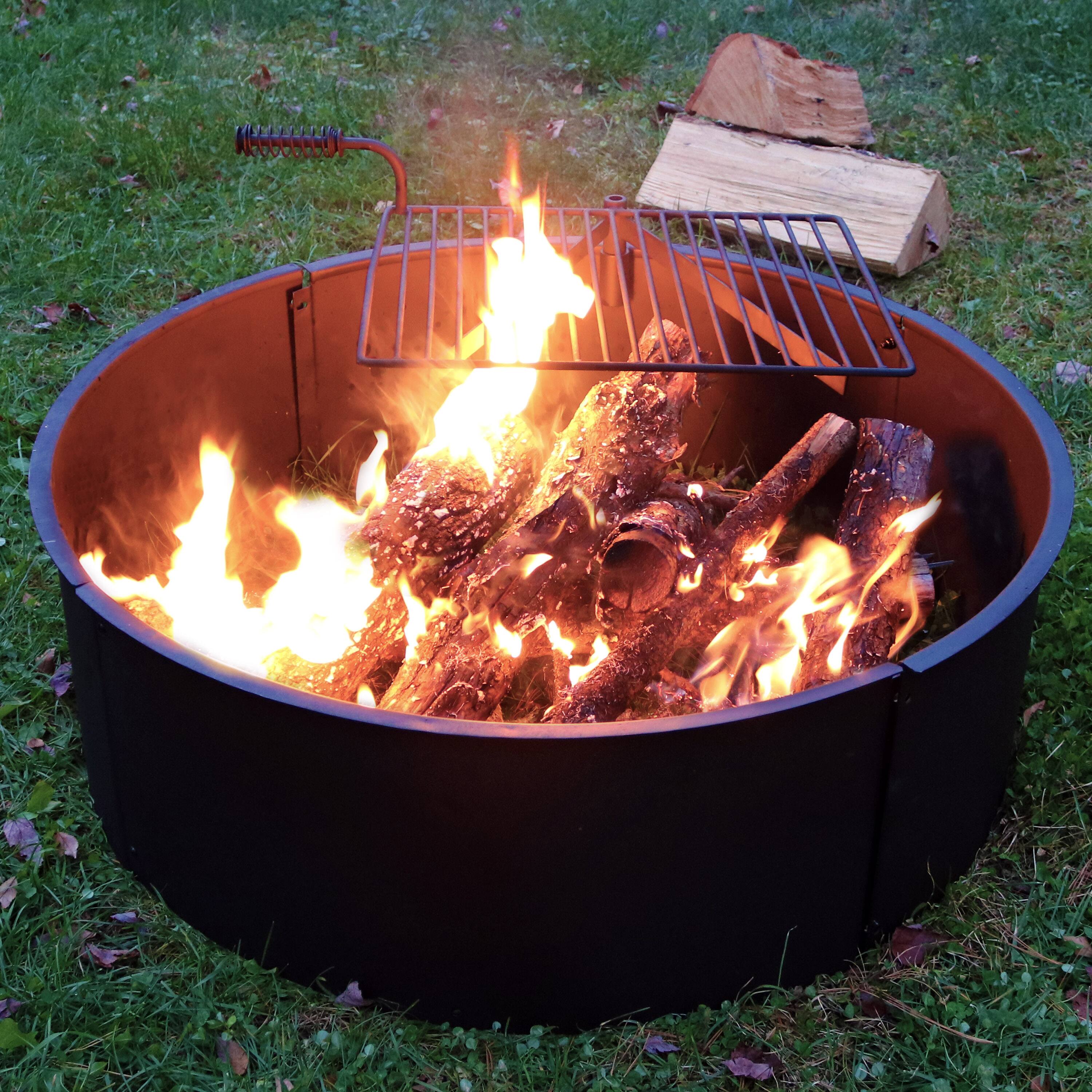 Alt View 4. Sunnydaze - 34 in Steel Fire Pit Ring with Swivel Cooking Grate/Poker - Black.