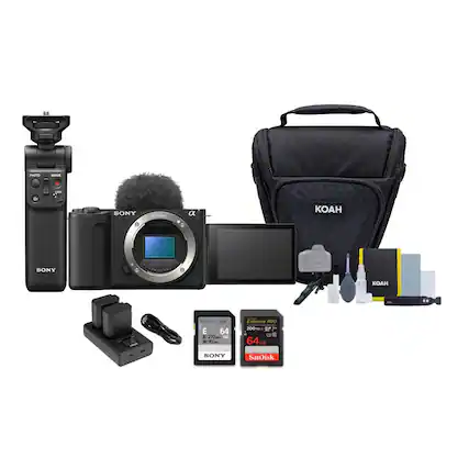 The image features a variety of Sony products, including a camera, a lens, and a bag. There is also a remote control and a memory card among the items. The products are arranged neatly, with the camera and lens placed next to each other, and the memory card and remote control nearby. The bag is positioned towards the right side of the image, completing the display of the Sony products.