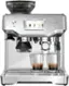 Left. Breville - the Barista Touch Espresso Machine with 9 bars of pressure, Milk Frother and integrated grinder - Stainless Steel.
