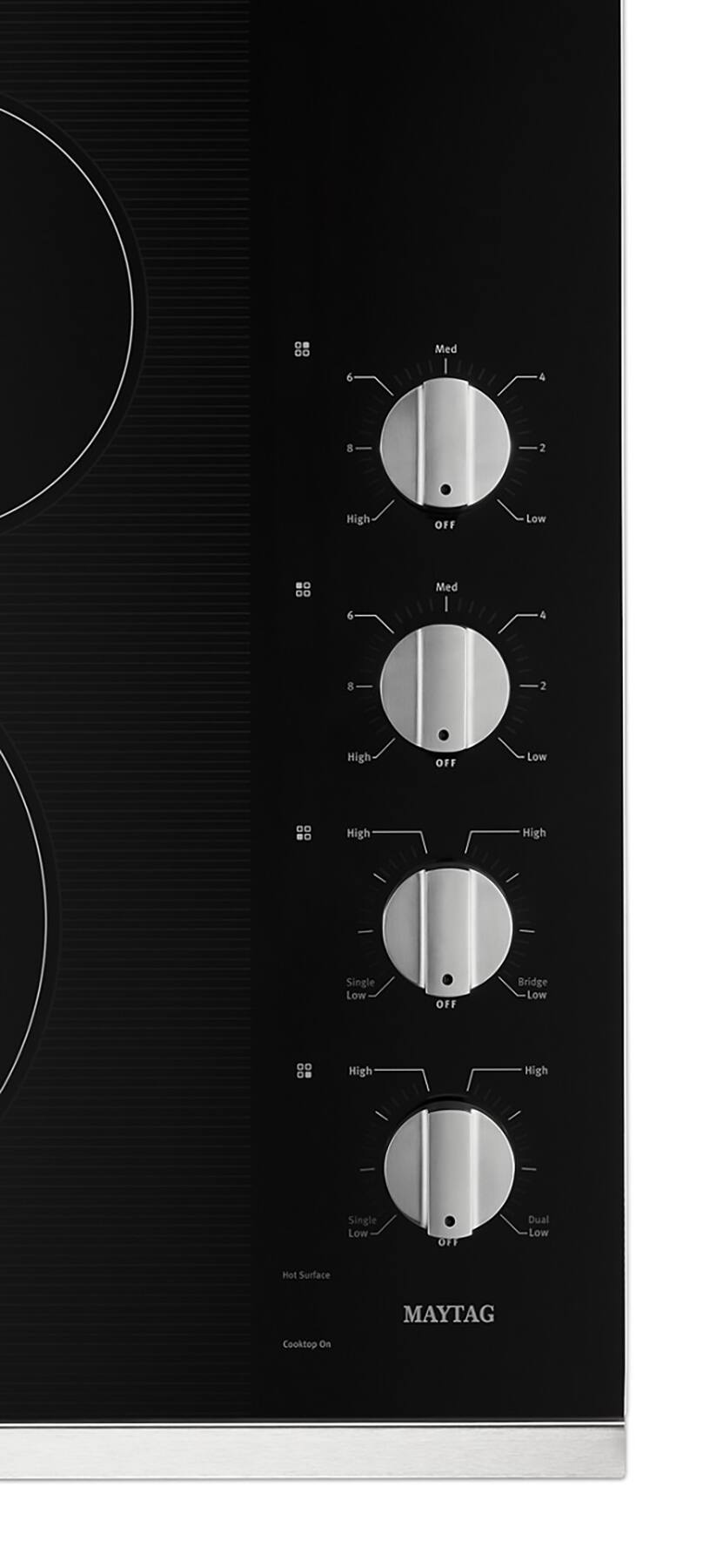 The text on the image reads:

DB D0 Med 5 4  2 High OFF Low D. Med 6 4 8 2 High OFF Low DO High High Single Low OFF Bridge Low High High Single Low OFF Dual Low Hot Surface MAYTAG Cooktop On A